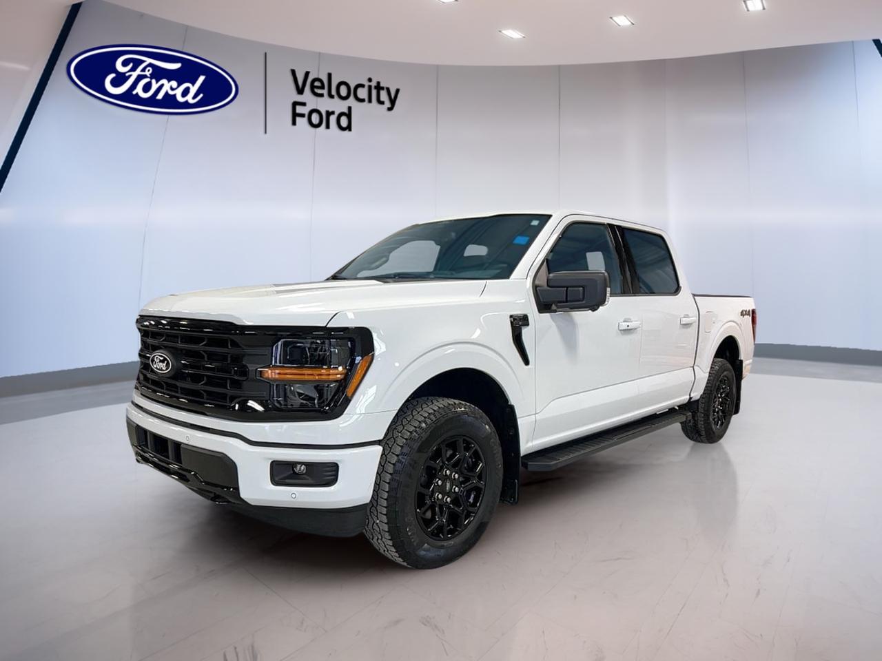 Meet the brand new 2026 Ford F-150 XLT SuperCrew at Velocity Ford in Moose Jaw, built to handle real work and still feel easy to live with every day. Finished in White with a Black interior, this 4-door truck pairs a 2.7 L gas engine with an automatic transmission for smooth, confident driving.

With four-wheel drive, off-road tires, and a strong towing rating of 4,671 kg, this 2026 Ford F-150 XLT SuperCrew is ready for Saskatchewan weather, job sites, and weekend getaways. It also brings the modern essentials you want, like a backup camera, Bluetooth integration, and a WiFi hotspot. Add in LED headlamps, fog lights, and automatic headlights, and you get clear vision in changing light and road conditions.

TRUCK FEATURES  
»» Towing capacity rated at 4,671 kg  
»» Four-wheel drive for tough conditions  
»» Rear tow hook for recovery support  
»» Off-road tires for added grip  

ADVANCED SAFETY FEATURES  
»» Anti-lock braking system helps maintain control  
»» Stability control supports confident handling  
»» Blind spot monitor helps change lanes  
»» Lane departure warning adds extra awareness  

PERFORMANCE AND EFFICIENCY  
»» 2.7 L gas engine for daily use  
»» Automatic transmission for smooth shifting  
»» Dual shift mode for driver control  
»» Power steering for easy low-speed turns  

COMFORT AND CONVENIENCE  
»» Front air conditioning for cabin comfort  
»» Power windows for quick adjustments  
»» Cruise control for relaxed highway drives  
»» Driver lumbar support for longer trips  

TECHNONOLGY AND CONNECTIVITY  
»» Bluetooth integration for calls and audio  
»» WiFi hotspot helps keep you connected  
»» Satellite radio for more listening choice  
»» Steering wheel audio controls for convenience  

CARGO SPACE  
»» Rear trunk access for easier loading  
»» Four doors for simpler cabin entry  
»» Spare tire onboard for peace of mind  
»» Tinted windows help protect interior items  

WHAT OTHER OWNERS LIKE  
»» Strong towing confidence for trailers and toys  
»» Easy-to-use driver-assist safety tech  
»» Comfortable ride for daily commuting  
»» Practical cabin storage and rear access  


This 2026 Ford F-150 XLT SuperCrews VIN is: 1FTEW3LP2TFA23179.