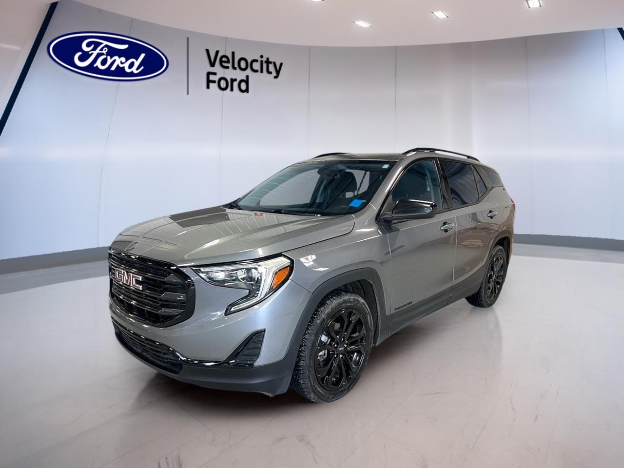 Take on winter streets and busy commutes with confidence in this used 2019 GMC Terrain SLE AWD, available now at Velocity Ford in Moose Jaw. Finished in Tin with a Black interior, this 4-door SUV pairs everyday comfort with smart features that make driving simpler. With 218,863
 km, its ready for its next chapter.

The 2019 GMC Terrain SLE AWD is powered by a 1.5 L gas engine and an automatic transmission for smooth, easy driving in town and on the highway. All-wheel drive adds extra grip when roads get slick, while a long list of convenience features helps you stay comfortable and in control. If you want a practical SUV with the right essentials, this Terrain fits the bill.

FEATURES OF THE Terrain SLE AWD  
»» All-wheel drive for added traction  
»» 1.5 L gas engine power  
»» Automatic transmission for easy driving  
»» Compact SUV size, easy parking  

ADVANCED SAFETY FEATURES  
»» Anti-lock braking system for controlled stops  
»» Stability control helps maintain road grip  
»» Driver airbag for front protection  
»» Side impact airbags for added safety  

PERFORMANCE AND EFFICIENCY  
»» 1.5 L gas engine for commuting  
»» Automatic transmission with dual shift mode  
»» All-wheel drive for confident handling  
»» Cruise control helps reduce fatigue  

COMFORT AND CONVENIENCE  
»» Front air conditioning for cabin comfort  
»» Dual-zone climate control for personalized settings  
»» Heated front seats for cold days  
»» Remote starter for quick warmups  

TECHNONOLGY AND CONNECTIVITY  
»» Backup camera for easier reversing  
»» Bluetooth integration for hands-free calling  
»» Steering wheel audio controls included  
»» WiFi hotspot helps keep you connected  

CARGO SPACE  
»» Rear trunk access for easy loading  
»» Four doors for simple entry  
»» Practical SUV layout for daily errands  
»» Spare tire onboard for peace  

WHAT OTHER OWNERS LIKE  
»» Confident feel from all-wheel drive  
»» Easy parking with backup camera  
»» Comfortable ride for daily commuting  
»» Handy remote start in winter  

This used 2019 GMC Terrain SLE AWD at Velocity Ford in Moose Jaw brings together the features drivers ask for most: heated mirrors, power windows, power outlet, automatic headlights, tinted windows, and an auto-dimming rearview mirror. You also get push button start, automatic door locks, tire pressure monitoring, and a drivers side power seat with lumbar support for better comfort on longer drives.

This 2019 GMC Terrain SLE AWDs VIN is: 3GKALTEV9KL357656.