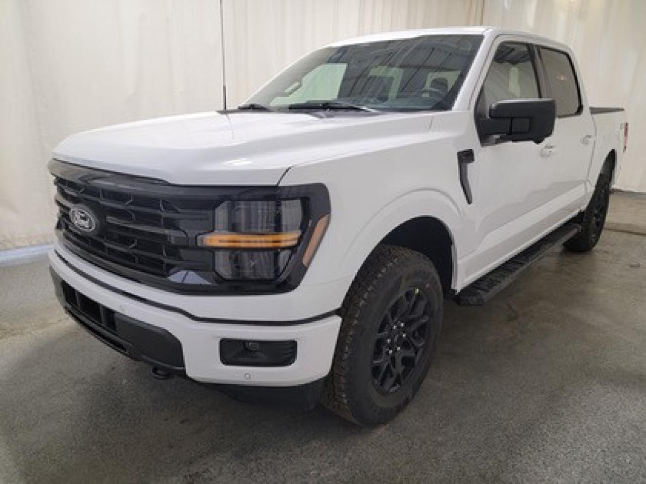 The all-new 2026 Ford F-150 XLT 302A is a statement of style in Oxford White. Powered by the 3.5L V6 engine, it delivers 400 horsepower and 500 lb-ft of torque, paired with a 10-speed automatic transmission. This truck achieves an impressive, combined fuel economy of 11.8 L/100 km (23 miles per gallon).

Key Features:
12 LCD Captivity Touchscreen
Electronic Power-Assist Steering
Dual-Zone Electronic Auto Temp Control
Cruise Control
Power Windows
AdvanceTrac® With Roll Stability Control
Perimeter Alarm
Ford Co-Pilot360
Lane Keeping System
Rear View Camera
Rear Parking Sensors
Reverse Park Assist
Class IV Trailer Hitch
Power Drivers Seat
Remote Start
SYNC®4
Apple Car Play
18 All Terrain Tires
Bluetooth Connectivity
XLT Black Appearance Package
Engine Block Heater

This vehicle comes with the All-Weather Packageready to take on any season!
Snow, rain, mud, or sunshinethis vehicle is built for it all! The All-Weather Package adds extra protection where it matters most, with premium mud flaps to shield your paint from road debris, all-weather floor mats to protect your interior from lifes messes, and Xpel paint protection to help guard against those infuriating rock chips. Drive with confidence, knowing your investment is protected from Regina's elements.

Bennett Dunlop Ford, proudly serving Regina for over 40 years, is conveniently located at 770 Broad Street. With over 3,500 Google reviews, our reputation reflects our commitment to providing a fast, easy, and enjoyable vehicle-buying experience. We eliminate the hassle with no admin or documentation fees, transparent upfront pricing that lets you shop with total confidence. But were more than just a dealershipwere driven to make a difference by supporting local community initiatives and events that matter to you. Visit Bennett Dunlop Ford today and experience why were Reginas trusted choice for quality vehicles, exceptional service, and a genuine commitment to driving change in our community!