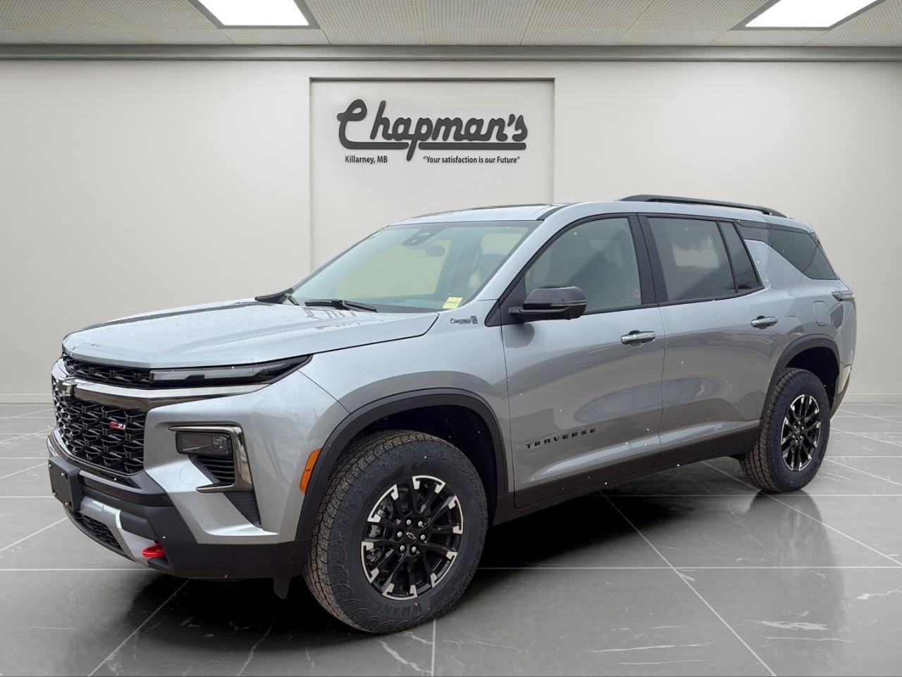 <p>Adventure-ready capability meets family-sized versatility in this <strong>2026 Chevrolet Traverse Z71 AWD</strong>, finished in <strong>Sterling Grey Metallic with a Jet Black Evotex interior featuring red accents</strong>. Designed for drivers who want rugged SUV capability without sacrificing comfort or technology, the Traverse Z71 delivers bold styling, advanced safety features, and seating for the whole crew.</p><p>Under the hood, a responsive <strong>2.5L Turbocharged DOHC engine paired with an 8-speed automatic transmission</strong> delivers strong performance and confident acceleration. The <strong>Advanced Twin-Clutch All-Wheel Drive system</strong> and <strong>Hill Descent Control</strong> enhance traction and control when road conditions get challenging, while <strong>all-terrain tires and off-road inspired Z71 styling</strong> give this SUV a rugged edge.</p><p>Inside the cabin, the Traverse offers a spacious <strong>7-passenger interior</strong> designed with comfort and practicality in mind. <strong>Heated front seats, a heated steering wheel, wireless phone charging, and an 11-inch driver information centre</strong> provide everyday convenience, while the <strong>AutoSense power liftgate and multiple USB ports in every row</strong> make family travel easier.</p><h3><strong>Performance & Capability</strong></h3><p>Confident power with off-road inspired capability.</p><ul><li><p>2.5L Turbocharged DOHC Engine</p></li><li><p>8-Speed Automatic Transmission</p></li><li><p>Advanced Twin-Clutch All-Wheel Drive System</p></li><li><p>Hill Descent Control</p></li><li><p>Special Ride & Handling Suspension</p></li><li><p>All-Terrain Tires</p></li><li><p>Trailering Equipment with Hitch Guidance</p></li><li><p>Hitch View Camera</p></li></ul><h3><strong>Interior Comfort & Convenience</strong></h3><p>Spacious and comfortable cabin designed for family travel.</p><ul><li><p>7-Passenger Seating</p></li><li><p>Heated Front Seats</p></li><li><p>Heated Steering Wheel</p></li><li><p>8-Way Power Driver Seat</p></li><li><p>AutoSense Power Liftgate</p></li><li><p>Wireless Phone Charging</p></li><li><p>120-Volt Power Outlet</p></li><li><p>Rear Seat Reminder</p></li></ul><h3><strong>Technology & Connectivity</strong></h3><p>Smart technology keeps everyone connected.</p><ul><li><p>11" Driver Information Centre Display</p></li><li><p>Remote Vehicle Start</p></li><li><p>SiriusXM Radio Capability</p></li><li><p>OnStar Basics (Up to 8 Years)</p></li><li><p>Six USB Ports (Two per Row)</p></li><li><p>Active Noise Cancellation</p></li></ul><h3><strong>Safety & Driver Assistance</strong></h3><p>Advanced driver-assist technology helps provide confidence behind the wheel.</p><ul><li><p>HD Surround Vision</p></li><li><p>Rear Camera Mirror</p></li><li><p>Rear Pedestrian Alert</p></li><li><p>Traffic Sign Recognition</p></li><li><p>Forward Collision Alert</p></li><li><p>Enhanced Automatic Emergency Braking</p></li><li><p>Lane Keep Assist with Lane Departure Warning</p></li><li><p>Following Distance Indicator</p></li><li><p>Rear Park Assist</p></li><li><p>Side Bicyclist Alert</p></li></ul><h3><strong>Exterior Highlights</strong></h3><p>Bold Z71 styling with rugged design elements.</p><ul><li><p>18" High Gloss Black Machined Aluminum Wheels</p></li><li><p>High Gloss Black Grille</p></li><li><p>All-Terrain Tires</p></li><li><p>Sterling Grey Metallic Exterior</p></li><li><p>Hitch Guidance with Hitch View</p></li><li><p>Roof Rails</p></li></ul><p>With rugged Z71 capability, advanced safety technology, spacious seating for seven, and modern connectivity, this <strong>2026 Chevrolet Traverse Z71 AWD</strong> is ready for family road trips, weekend adventures, and everything in between.</p><p>2 Year/24,000 kilometer* Complimentary Oil Changes (2 total)</p><p>3 Year/60,000 kilometer* Base Warranty Coverage</p><p>5 Year/100,000 kilometer* Powertrain Component Warranty Coverage</p><p>5 Year/100,000 kilometer* Courtesy Transportation and 24/7 Roadside Assistance</p><p>6 Year/160,000 kilometer* Sheet Metal (Rust Through) Perforation Warranty Coverage</p><p>*Whichever Comes First.</p><p>Price Includes Dealer Fee.</p><p>Price Excludes PST & GST.</p><p>Financing Options Available, Call For More Details.</p> <p><strong>*While every reasonable effort is made to ensure the accuracy of this information, we are not responsible for any error or omissions contained on these pages. Please verify any information in question with Chapman Motors Ltd.</strong></p>