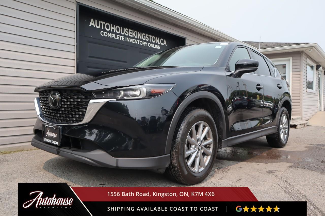 <p><strong>The 2022 Mazda CX-5 GX</strong><span style=color:rgba( 0 , 0 , 0 , 0.9 )>  Featuring a 2.5-liter Skyactiv-G inline-4 delivering i-Activ all-wheel drive, achieving an <strong>estimated 9.8 L/100km city and 7.9 L/100km highway fuel efficiency</strong>. The GX trim showcases Mazda's signature sleek styling with LED headlights with automatic on/off, body-coloured power side mirrors, and 17-inch alloy wheels, premium cloth seating includes heated front seats, dual-zone automatic climate control, and an 8.8-inch Mazda Connect infotainment display with Apple CarPlay, Android Auto, Bluetooth hands-free phone and audio streaming, and a 6-speaker audio system. i-Activsense safety technology includes Advanced Blind Spot Monitoring, Rear Cross Traffic Alert, Smart City Brake Support with pedestrian detection, Lane Departure Warning, and Rear Parking Sensors. Additional features include keyless entry with push-button start, heated power side mirrors, and a clean CARFAX with 1 Owner.</span></p>
