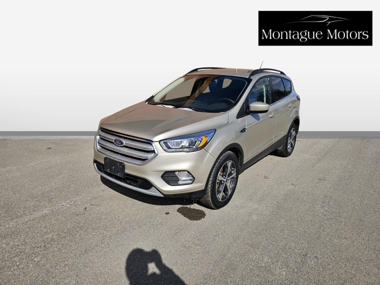 <p>2018 Ford Escape SEL AWD  145k KM  19 Service Records  Clean Title but Total Loss Record (Carfax attached in pictures)</p><p>Looking for a well-maintained, feature-packed AWD SUV at a significant discount? This 2018 Ford Escape SEL has been exceptionally cared for with <strong>19 documented service records</strong>.</p><p><strong>Important Note on Value:</strong> This vehicle carries a <strong>Clean Title (Unbranded)</strong>, but please note it has a "Total Loss" declaration on the history report from a previous insurance claim. This is reflected in the below-market asking price. Carfax is attached in the pictures.</p><p><strong>SEL Trim Features:</strong></p><ul><li><p><strong>Intelligent AWD:</strong> Great for Ontario winters.</p></li><li><p><strong>SYNC 3 Infotainment:</strong> Apple CarPlay & Android Auto on an 8-inch touchscreen.</p></li><li><p><strong>Leather Interior:</strong> Heated front seats and power drivers seat.</p></li><li><p><strong>Power Liftgate:</strong> Hands-free convenience.</p></li><li><p><strong>Safety:</strong> Reverse sensors, backup camera, and LED signature lighting.</p></li></ul><p><strong>Vehicle Stats:</strong></p><ul><li><p><strong>Mileage:</strong> 145,000 km.</p></li><li><p><strong>History:</strong> 19 Service records (oil changes, brakes, and fluid flushes are up to date).</p></li><li><p><strong>Condition:</strong> Clean inside and out. No mechanical lights on the dash.</p></li></ul><p>Credit Cards Accepted</p><p>Please call for more info and to book a test drive at 888-996-6510. Car-Fax is included in the asking price. Extended Warranties are also available. We offer financing too. Certification: Have your new pre-owned vehicle certified. We offer a full safety inspection including oil change, and professional detailing prior to delivery. Certification package is available for $799. All trade-ins are welcome. Taxes and licensing are extra.***</p>