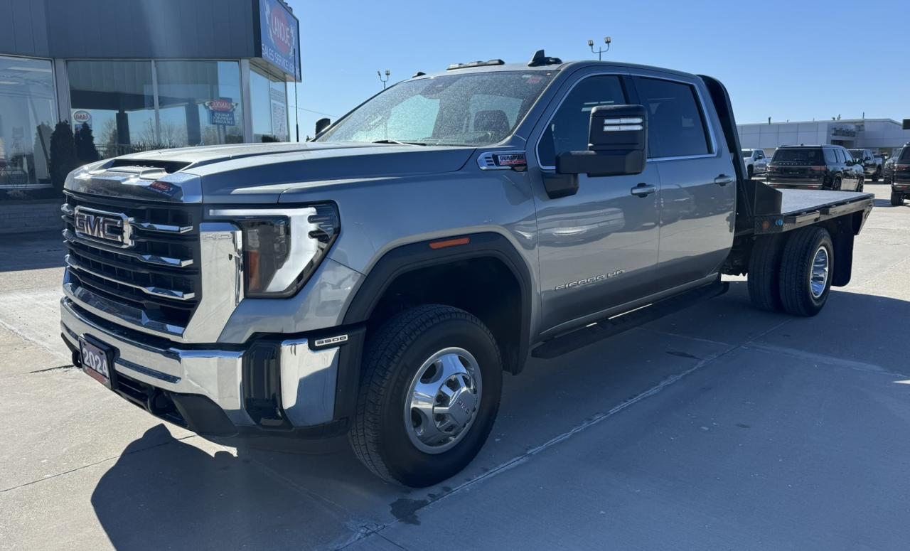 <p style=text-align: center;><strong><span style=font-size: 18pt;>2024 GMC SIERRA 3500 FLAT BED 4WD DRW CREW CAB 177 WB, 60 CA SLE</span></strong></p><p style=text-align: center;><strong><span style=font-size: 18pt;>6.6L DURAMAX V8 TURBO DIESEL</span></strong></p><p style=text-align: center;><span style=font-size: 14pt;>470 HORSEPOWER | 975 LB-FT OF TORQUE | 3.42 AXLE RATIO</span></p><p style=text-align: center;><span style=font-size: 14pt;>TOWING CAPACITY: 20,000 LBS | PAYLOAD: 5,667 LBS | GVWR: 14,000 LBS</span></p><p style=text-align: center;><strong><span style=font-size: 18pt;>ALLISION 10-SPEED AUTOMATIC TRANSMISSION</span></strong></p><p style=text-align: center;><strong><span style=font-size: 18pt;>17 STEEL WHEELS</span></strong></p><p style=text-align: center;>&nbsp;</p><p style=text-align: center;><strong><span style=font-size: 14pt;>SAFETY & SECURITY</span></strong></p><p style=text-align: center;><span style=font-size: 14pt;>Automatic Emergency Braking, Forward Collision Alert, Front Pedestrian Braking, Lane Departure Warning, Following Distance Indicator, Intellibeam-Auto High Beam, Teen Driver Mode, Rear Seat Reminder</span></p><p style=text-align: center;><strong><span style=font-size: 14pt;>PERFORMANCE & MECHANICAL</span></strong></p><p style=text-align: center;><span style=font-size: 14pt;>Trailer Brake Controller, Auto Locking Rear Differential, Heavy-Duty Air Filter, External Engine Oil Cooler, Auxiliary Exterior Transmission Oil Cooler, Stabilitrak w/ Trailer Sway Control & Hill Start Assist, Brake Pad Wear Indicator</span></p><p style=text-align: center;><strong><span style=font-size: 14pt;>CONNECTIVITY & TECHNOLOGY</span></strong></p><p style=text-align: center;><span style=font-size: 14pt;>GMC Premium Infotainment System, 13.4 Colour Touchscreen with Google Built-in Compatibility Including Nav Capability, Bluetooth, Wireless Apple Carplay and Wireless Android Auto, Keyless Open and Start SiriusXM, OnStar & Wi-Fi Hotspot Capable</span></p><p style=text-align: center;><strong><span style=font-size: 14pt;>INTERIOR</span></strong></p><p style=text-align: center;><span style=font-size: 14pt;>12.3 Diag. Reconfigurable Driver Information Centre, Steering Wheel Audio Controls, Cruise Control, Power Windows, Power Door Locks, Rear 60/40 Folding Bench Seat, Tire Pressure Monitor System</span></p><p style=text-align: center;><strong><span style=font-size: 14pt;>EXTERIOR</span></strong></p><p style=text-align: center;><span style=font-size: 14pt;>Chrome Wheel Trim Skins and Chrome Centre Caps, Chrome Front Bumper, Power Adjustable Mirrors w/ Heated Upper Glass, Lower Convex Mirror & Integrated Turn Signals, Deep Tint Rear Glass, Front Recovery Hooks</span></p><p style=text-align: center;>&nbsp;</p><p style=text-align: center;><span style=font-size: 14pt;><strong>OPTIONAL EQUIPMENT</strong></span></p><p style=text-align: center;><span style=font-size: 14pt;><em><span style=text-decoration: underline;>SLE Convenience Package:</span></em></span><br><span style=font-size: 14pt;> Dual-Zone Automatic Climate Control, 10-Way Power Driver Seat,&nbsp;Manual Tilt and Telescoping Steering Column,&nbsp;120V AC Power Outlet on Instrument Panel,&nbsp;Front LED Fog Lamps, </span></p><p style=text-align: center;><span style=font-size: 14pt;><em><span style=text-decoration: underline;>Remote Start Package:</span></em></span><br><span style=font-size: 14pt;>Remote Vehicle Start, Rear Window Defogger</span></p><p style=text-align: center;><span style=font-size: 14pt;><em><span style=text-decoration: underline;>SLE Heat Package:</span></em></span><br><span style=font-size: 14pt;>Heated Driver and Front Outboard Passenger Seats, Heated Steering Wheel</span></p><p style=text-align: center;><span style=font-size: 14pt;><em><span style=text-decoration: underline;>Duramax 6.6L V8 Turbo Diesel:</span></em></span><br><span style=font-size: 14pt;>Includes 160,000KM powertrain component warranty</span></p><p style=text-align: center;><span style=font-size: 14pt;><em><span style=text-decoration: underline;>Front Bucket Seats with Centre Console:</span></em></span><br><span style=font-size: 14pt;>Includes Wireless Charging</span></p><p style=text-align: center;><span style=font-size: 14pt;><em><span style=text-decoration: underline;>Autotrac Two-Speed Transfer&nbsp;Case</span></em></span></p><p style=text-align: center;><span style=font-size: 14pt;><em><span style=text-decoration: underline;>Snow Plow Prep/Camper Package</span></em></span></p><p style=text-align: center;><span style=font-size: 14pt;><em><span style=text-decoration: underline;>Upfitter Switch Kit</span></em></span></p><p style=text-align: center;>&nbsp;</p><p style=text-align: center;>&nbsp;</p><p style=box-sizing: border-box; margin-bottom: 1rem; margin-top: 0px; color: #212529; font-family: -apple-system, BlinkMacSystemFont, Segoe UI, Roboto, Helvetica Neue, Arial, Noto Sans, Liberation Sans, sans-serif, Apple Color Emoji, Segoe UI Emoji, Segoe UI Symbol, Noto Color Emoji; font-size: 16px; background-color: #ffffff; text-align: center; line-height: 1;><span style=box-sizing: border-box; font-family: arial, helvetica, sans-serif;><span style=box-sizing: border-box; font-weight: bolder;><span style=box-sizing: border-box; font-size: 14pt;>One Key Guaranteed with purchase. if we have a second key it will be provided, additional keys/fobs availble at a cost</span></span></span></p><p style=box-sizing: border-box; margin-bottom: 1rem; margin-top: 0px; color: #212529; font-family: -apple-system, BlinkMacSystemFont, Segoe UI, Roboto, Helvetica Neue, Arial, Noto Sans, Liberation Sans, sans-serif, Apple Color Emoji, Segoe UI Emoji, Segoe UI Symbol, Noto Color Emoji; font-size: 16px; background-color: #ffffff; text-align: center; line-height: 1;>&nbsp;</p><p style=box-sizing: border-box; margin-bottom: 1rem; margin-top: 0px; color: #212529; font-family: -apple-system, BlinkMacSystemFont, Segoe UI, Roboto, Helvetica Neue, Arial, Noto Sans, Liberation Sans, sans-serif, Apple Color Emoji, Segoe UI Emoji, Segoe UI Symbol, Noto Color Emoji; font-size: 16px; background-color: #ffffff; text-align: center; line-height: 1;><span style=box-sizing: border-box; font-family: arial, helvetica, sans-serif;><span style=box-sizing: border-box; font-weight: bolder;><span style=box-sizing: border-box; font-size: 14pt;>Here at Lanoue/Amfar Sales, Service & Leasing in Tilbury, we take pride in providing the public with a wide variety of High-Quality Pre-owned Vehicles. We recondition and certify our vehicles to a level of excellence that exceeds the Status Quo. We treat our Customers like family and provide the highest level of service from Start to Finish. If you&rsquo;d like a smooth & stress-free car shopping experience, give one of our Sales Associates a call at 1-844-682-3325 to help you find your next NEW-TO-YOU vehicle!</span></span></span></p><p>&nbsp;</p><p style=box-sizing: border-box; margin-bottom: 1rem; margin-top: 0px; color: #212529; font-family: -apple-system, BlinkMacSystemFont, Segoe UI, Roboto, Helvetica Neue, Arial, Noto Sans, Liberation Sans, sans-serif, Apple Color Emoji, Segoe UI Emoji, Segoe UI Symbol, Noto Color Emoji; font-size: 16px; background-color: #ffffff; text-align: center; line-height: 1;><span style=box-sizing: border-box; font-family: arial, helvetica, sans-serif;><span style=box-sizing: border-box; font-weight: bolder;><span style=box-sizing: border-box; font-size: 14pt;>Although we try to take great care in being accurate with the information in this listing, from time to time, errors occur. The vehicle is priced as it is physically equipped. Minor variances will not effect pricing. Please verify the vehicle is As Expected when you visit. Thank You!</span></span></span></p>