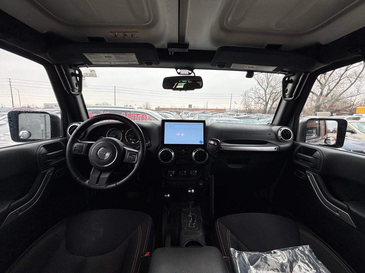 2015 Jeep Wrangler UNLIMITED 4WD 4DR SAHARA Photo