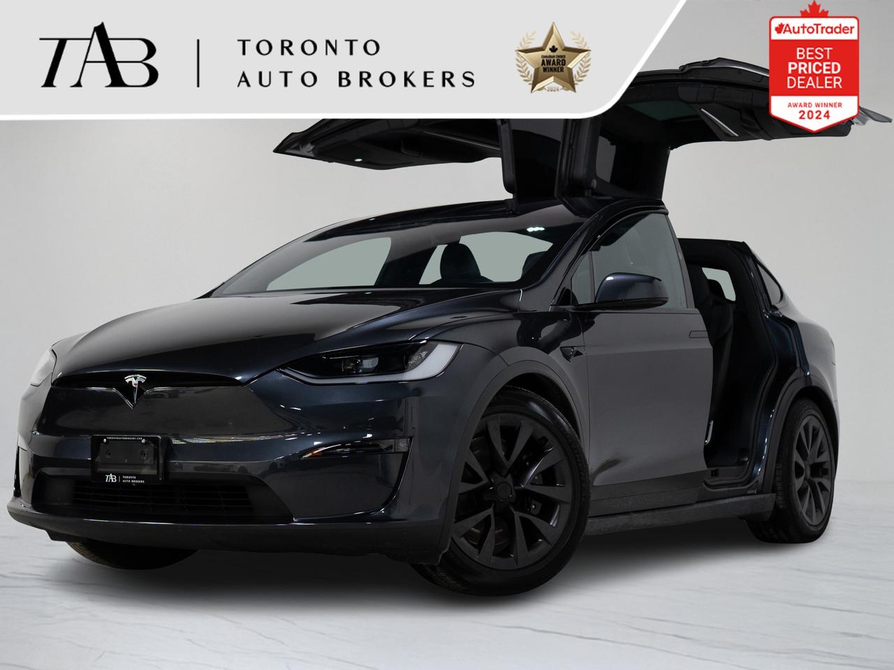 This 2025 Tesla Model X is a local Ontario vehicle with remaining manufacturer warranty valid until October 23rd, 2029, or up to 80,000 km. Featuring 6-passenger seating, yoke steering, and 22-inch wheels, this all-electric luxury SUV offers cutting-edge technology, spacious comfort, and unmatched performance.

Top Key Features:

1. 6-Passenger Seating
2. Yoke Steering Wheel
3. 22-Inch Alloy Wheels
4. All-Electric Performance
5. Autopilot & Advanced Driver Assistance
6. Premium Interior Finishes
7. Panoramic Windshield
8. Heated & Power-Adjustable Seats
9. Dual-Zone Climate Control
10. Infotainment System with Streaming & Navigation
11. Over-the-Air Software Updates
12. Full Glass Roof


NOW OFFERING 3 MONTH DEFERRED FINANCING PAYMENTS ON APPROVED CREDIT.

 WE OFFER THE BEST FINANCE RATES, AND DONT CHARGE ANY FINANCING FEE

 Looking for a top-rated pre-owned luxury car dealership in the GTA? Look no further than Toronto Auto Brokers (TAB)! Were proud to have won multiple awards, including the 2024 AutoTrader Best Priced Dealer, the 2024 CarGurus Award, the 2025 Top Choice Award, the 2025 Consumer Satisfaction Award, the 2025 Canadian Choice Award, the 2025 Three Best Rated Dealer Award, and many more!

With 30 years of experience serving the Greater Toronto Area, TAB is a respected and trusted name in the pre-owned luxury car industry. Our 30,000 sq.Ft indoor showroom is home to a wide range of luxury vehicles from top brands like BMW, Mercedes-Benz, Audi, Porsche, Land Rover, Jaguar, Aston Martin, Bentley, Maserati, and more. And we dont just serve the GTA, were proud to offer our services to all cities in Canada, including Vancouver, Montreal, Calgary, Edmonton, Winnipeg, Saskatchewan, Halifax, and more.

At TAB, were committed to providing a no-pressure environment and honest work ethics. As a family-owned and operated business, we treat every customer like family and ensure that every interaction is a positive one. Come experience the TAB Lifestyle at its truest form, luxury car buying has never been more enjoyable and exciting!

We offer a variety of services to make your purchase experience as easy and stress-free as possible. From competitive and simple financing and leasing options to extended warranties, aftermarket services, and full history reports on every vehicle, we have everything you need to make an informed decision. We welcome every trade, even if youre just looking to sell your car without buying, and when it comes to financing or leasing, we offer same day approvals, with access to over 50 lenders, including all of the banks in Canada. Feel free to check out your own Equifax credit score without affecting your credit score, simply click on the Equifax tab above and see if you qualify.

Call us today or visit our website to learn more about our inventory and services. And remember, all prices exclude applicable taxes and licensing, and vehicles can be certified at an additional cost of $999.