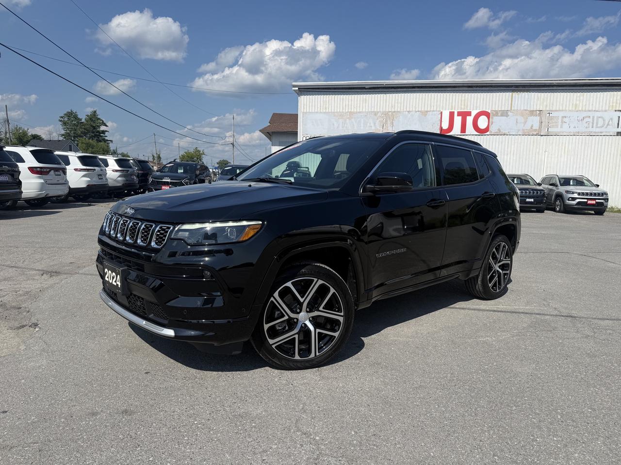 2024 JEEP COMPASS LIMITED ELITE 4X4.  2.0L TURBO ENGINE WITH 8 SPEED AUTO TRANSMISSION.  10.1" SCREEN WITH NAVIGATION, 360 SURROUND VIEW CAMERA, POWER LIFTGATE, LEATHER HEATED & COOLED SEATS, REMOTE START, HEATED STEERING WHEEL, POWER DRIVER & PASSENGER SEATS WITH DRIVER MEMORY SETTINGS, WIRELESS CHARING PAD, ACTIVE DRIVING ASSIST SYSTEM, ADAPTIVE CRUISE CONTROL, WPARALLEL & PERPENDICULAR PARK ASSIST, BLIND SPOT MONITORING WITH REAR CROSS PATH DETECTION, FORWARD COLLISION WARNING WITH ACTIVE BRAKING, PEDESTRIAN/CYCLIST EMERGENCY BRAKING, ADVANCED BRAKE ASSIST, FRONT & REAR PARK ASSIST, DUAL ZONE CLIMATE CONTROL, WINDSHIELD WIPER DE-ICER, AUTO HIGH BEAMS, & MORE!  ONLY HST EXTRA.