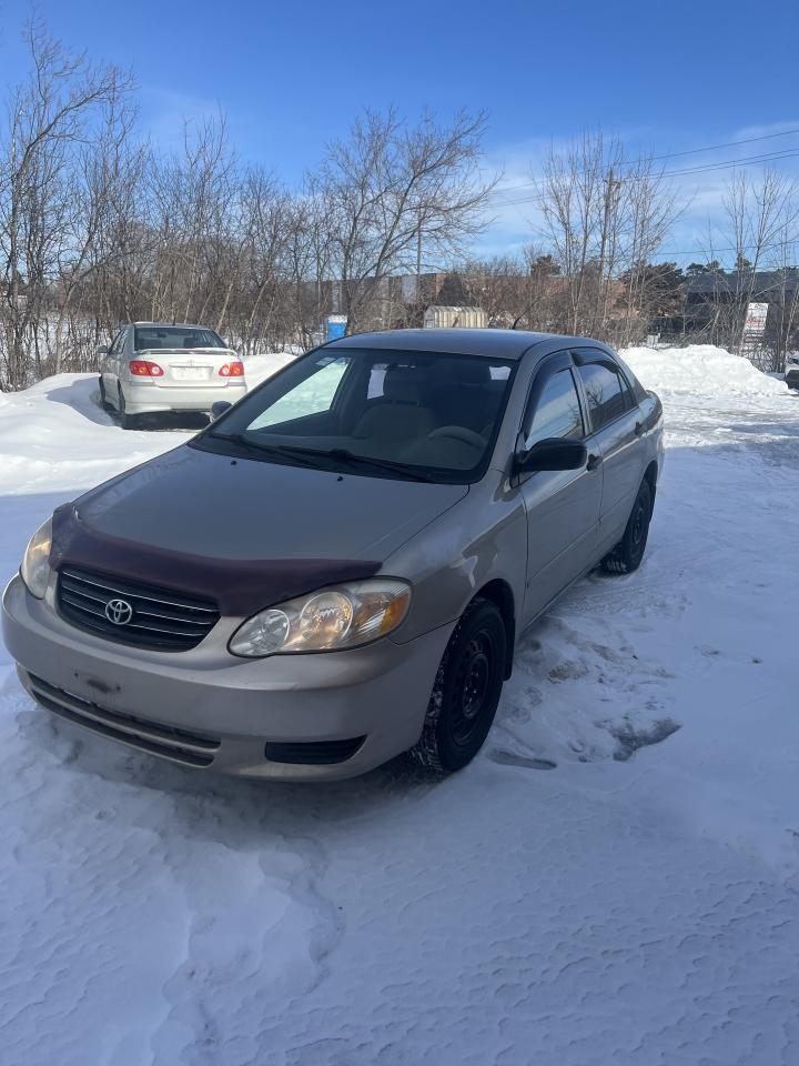 2004 Toyota Corolla 4dr Sdn CE Auto ac power windows,locks Photo