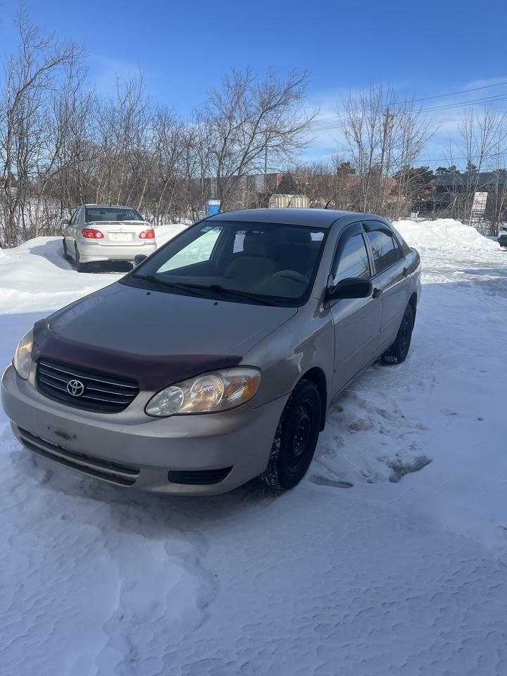 2004 Toyota Corolla 4dr Sdn CE Auto ac power windows,locks Photo