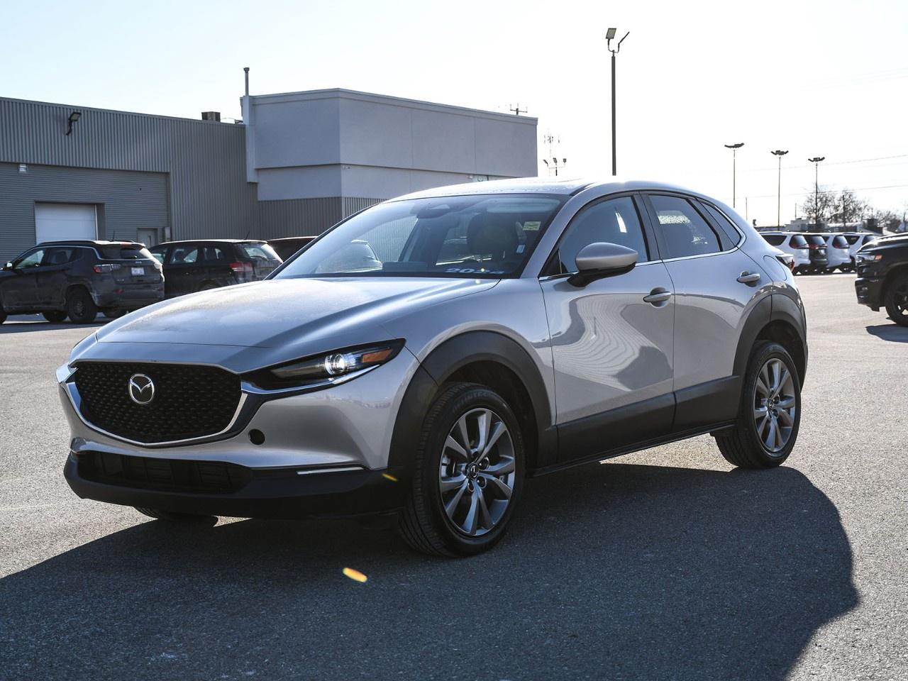 2024 Mazda CX-30 4D Sport Utility GS Platinum Quartz Metallic **PREVIOUS RENTAL**, 10-Way Power Adjustable Driver's Seat w/Memory, 4-Wheel Disc Brakes, 8 Speakers, ABS brakes, Air Conditioning, Alloy wheels, AppLink/Apple CarPlay and Android Auto, Auto High-beam Headlights, Auto-Dimming Interior Rear-View Mirror, Automatic temperature control, Brake assist, Delay-off headlights, Electronic Stability Control, Emergency communication system: Mazda Connected Services (2-year trial subscription included), Exterior Mirrors w/Reverse Tilt Down Function, Exterior Parking Camera Rear, Front dual zone A/C, Fully automatic headlights, Heated door mirrors, Heated front seats, Heated Front Seats (3 Settings), Heated steering wheel, Leatherette Trimmed Upholstery, Luxury Package, Package LP00, Power-Operated Glass Moonroof w/Interior Sunshade, Radio: AM/FM/HD w/Navigation-Ready, Rain sensing wipers, Remote keyless entry, Spoiler, Steering wheel mounted audio controls, Traction control, Variably intermittent wipers, Wheels: 18''' Silver Metallic Finish Alloy. AWD I4 6-Speed Automatic<br /><br /><br />Here at Chatham Chrysler, our Financial Services Department is dedicated to offering the service that you deserve. We are experienced with all levels of credit and are looking forward to sitting down with you. Chatham Chrysler Proudly serves customers from London, Ridgetown, Thamesville, Wallaceburg, Chatham, Tilbury, Essex, LaSalle, Amherstburg and Windsor with no distance being ever too far! At Chatham Chrysler, WE CAN DO IT!