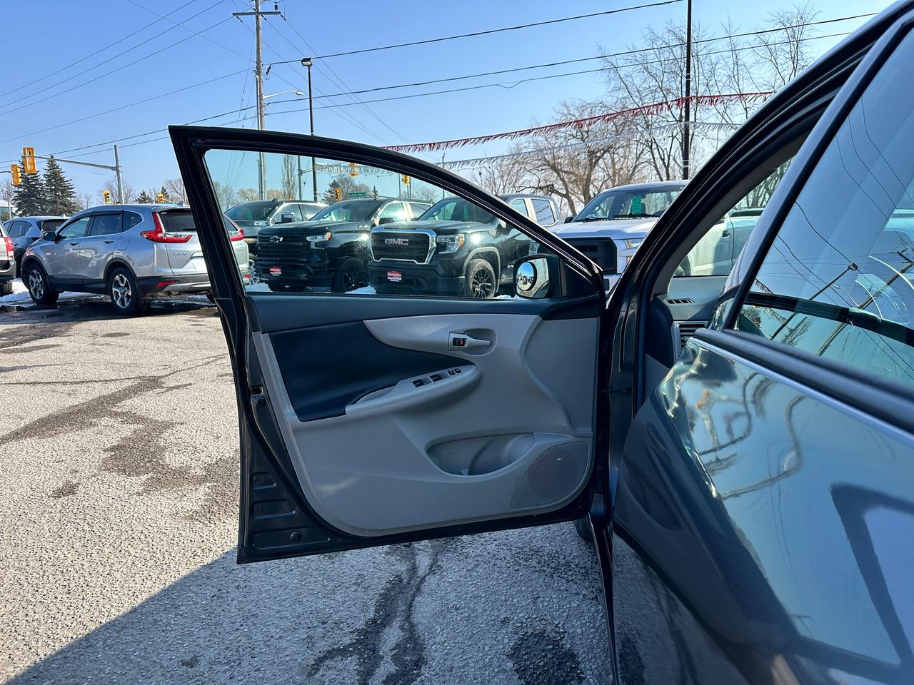 2013 Toyota Corolla CE Heated-Leather Sunroof Bluetooth AC FM CDPlayer Photo