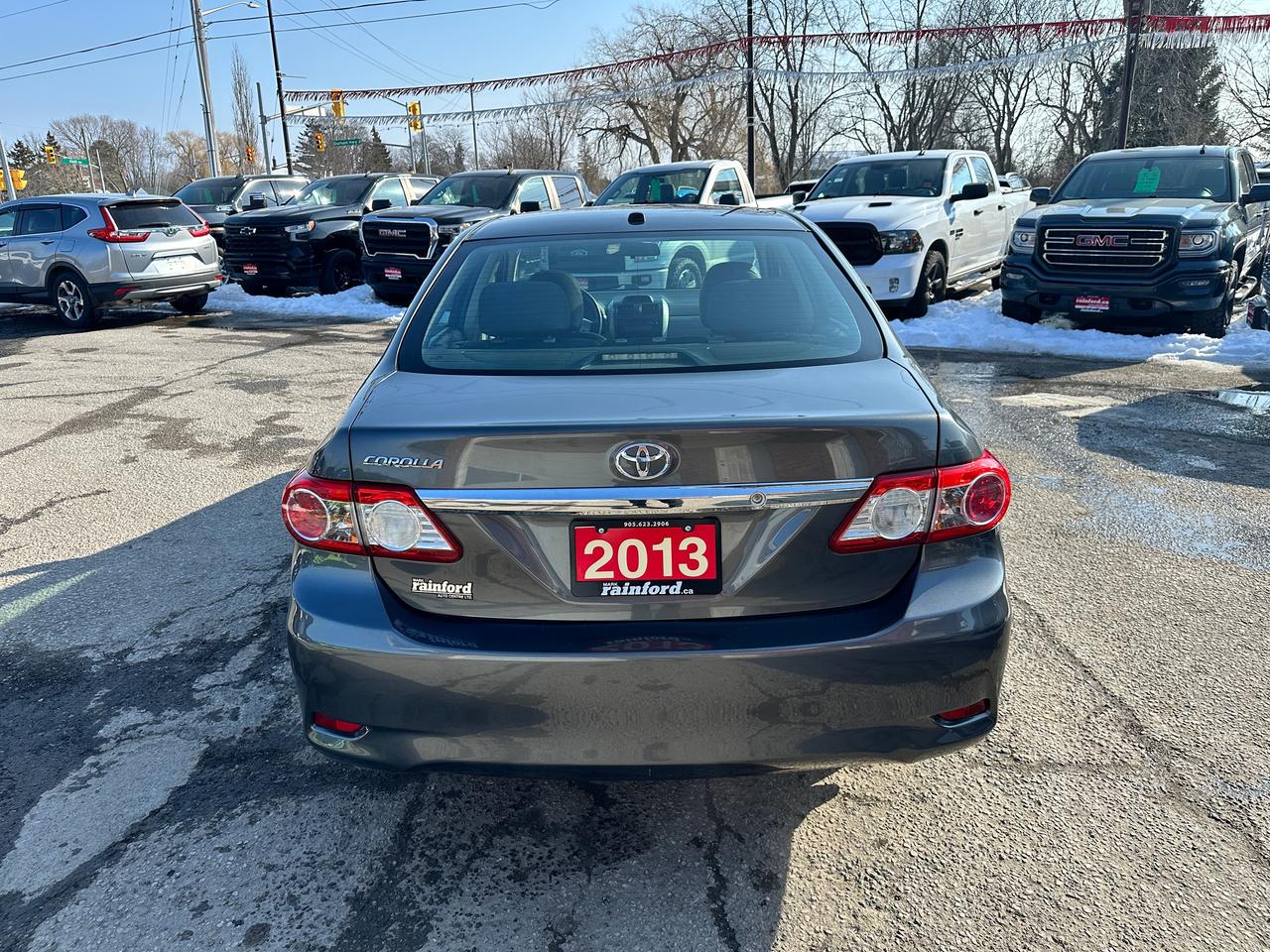2013 Toyota Corolla CE Heated-Leather Sunroof Bluetooth AC FM CDPlayer Photo3