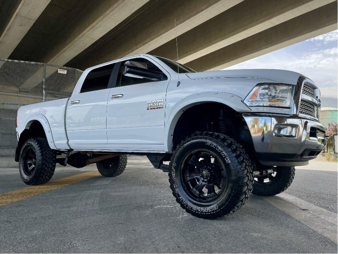 6 SPEED MANUAL, 6.7 CUMMINS DIESEL, BDS LIFTED, 20" WHEELS 37" M/T TIRES, TUNED, PAINTED BUSHWHACKER FLARES, FULLY LOADED LARMAIE, NAVI, SUNROOF, HEATED COOLED LEATHER, B/U CAMERA, SPRAY LINER!!!! 

ONLY 115,000KM @!@@

ALL NEW BALL JOINTS JUST DONE, NEW UPGRADED TRANSTAR CLUTCH KIT & FLY WHEEL OVER 10K IN RECON!!! 

Price does not include $599 documentation fee and/or $699 finance fee.