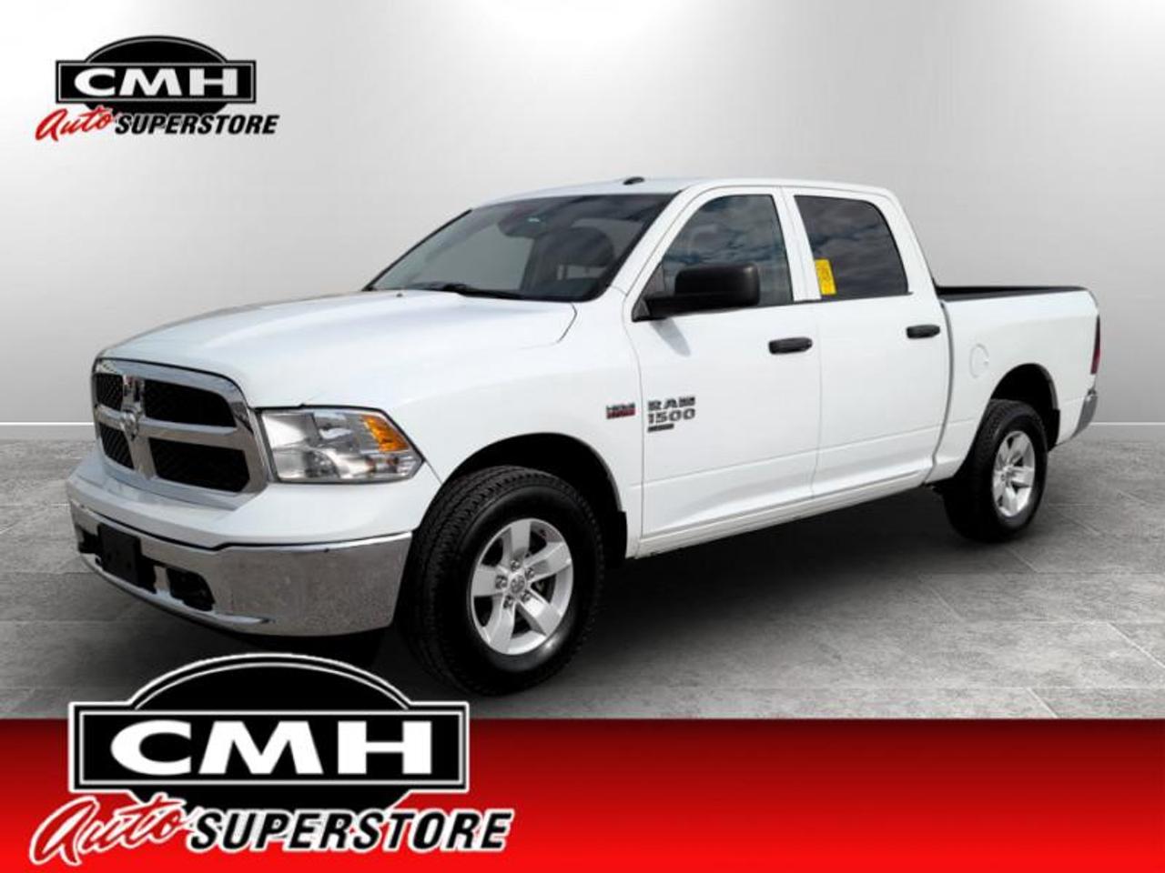 <b>CREW 4X4 !! V8 HEMI !! REAR CAMERA, BLUETOOTH, TOUCH DISPLAY, AUX + USB PORTS, CRUISE CONTROL, BENCH FRONT SEAT, POWER DRIVER SEAT, TRAILER BRAKE CONTROLLER, POWER GROUP, AIR CONDITIONING, 17-INCH ALLOY WHEELS **PREV. RENTAL**<br> <br></b><br>  <br>CMH certifies that all vehicles meet DOUBLE the Ministry standards for Brakes and Tires. The advertised price is the promotional financing price. For all other methods of payment, the selling price is $500 higher.<br><br> <br>This 2023 Ram 1500 Classic is for sale today. <br> <br>The reasons why this Ram 1500 Classic stands above its well-respected competition are evident: uncompromising capability, proven commitment to safety and security, and state-of-the-art technology. From its muscular exterior to the well-trimmed interior, this 2023 Ram 1500 Classic is more than just a workhorse. Get the job done in comfort and style while getting a great value with this amazing full-size truck. This Crew Cab 4X4 pickup has 84,339 km. Its Bright White in colour and is major accident free based on the <a href=https://vhr.carfax.ca/?id=qJ+6Hn50FC+IL283wcOfnEih/VS/Wuzz target=_blank>CARFAX Report</a>. It has an Automatic transmission and is powered by a 395HP 5.7L 8 Cylinder Engine. <br> <br> Our 1500 Classics trim level is SLT. This Ram 1500 SLT steps things up with upgraded aluminum wheels, proximity keyless entry, USB connectivity and exterior chrome styling, along with a great selection of standard features such as a wiring harness, , heavy-duty suspension, cargo box lighting, and a locking tailgate. Additional features include heated and power adjustable side mirrors, UCconnect 3, cruise control, air conditioning, vinyl floor lining, and a rearview camera.<br> To view the original window sticker for this vehicle view this <a href=http://www.chrysler.com/hostd/windowsticker/getWindowStickerPdf.do?vin=3C6RR7LT2PG621345 target=_blank>http://www.chrysler.com/hostd/windowsticker/getWindowStickerPdf.do?vin=3C6RR7LT2PG621345</a>. <br/><br> <br>To apply right now for financing use this link: <a href=https://www.cmhniagara.com/financing/ target=_blank>https://www.cmhniagara.com/financing/</a><br><br> <br/><br>**PLEASE NOTE:** The functionality and condition of any accessories and aftermarket parts are not guaranteed by CMH Auto Superstore. Examples of such items include, but are not limited to: tonneau covers, radios, cameras, remote starts, vent visors, roof racks, winches, light bars, headlights/tail lights, center caps, running boards, etc. If an aftermarket part is safety-related and found to be defective, it will be replaced by a factory option.<br><b>**CMH Auto Superstore reserves the right to choose to repair, modify, or replace all aftermarket parts (example  headlights) or accessories at its sole discretion.**</b><br><br>Trade-ins are welcome! Financing available OAC ! Price INCLUDES a valid safety certificate! Price INCLUDES a 60-day limited warranty on all vehicles except classic or vintage cars. CMH is a Full Disclosure dealer with no hidden fees. We are a family-owned and operated business for over 30 years! o~o