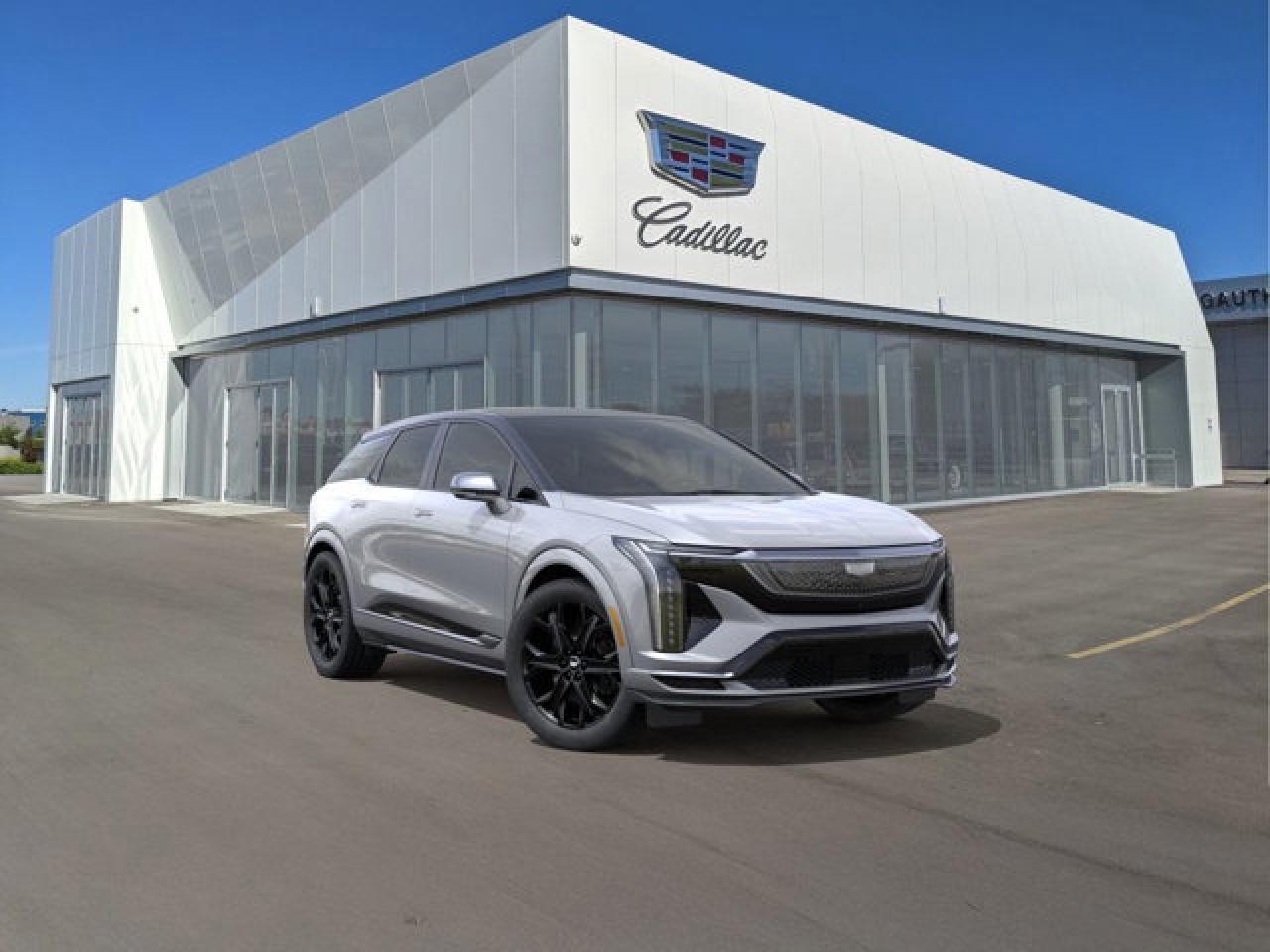 The 2026 Cadillac OPTIQ-V is an all-electric performance SUV in Cadillacs V-Series lineup, pairing a dual-motor all-wheel-drive powertrain with an estimated 519 hp and 650 lb-ft of torque. It combines sporty exterior elements like gloss-black and carbon-fiber accents with Brembo performance brakes, adaptive damping suspension, and a driver-selectable V-Mode for customizable performance settings. Inside, the luxury cabin features a large 33-inch advanced LED display, premium AKG sound with Dolby Atmos, Super Cruise hands-free driving and a suite of modern safety and driver-assist technologies. All of this is built around an EV platform with an estimated 440 km range per charge.