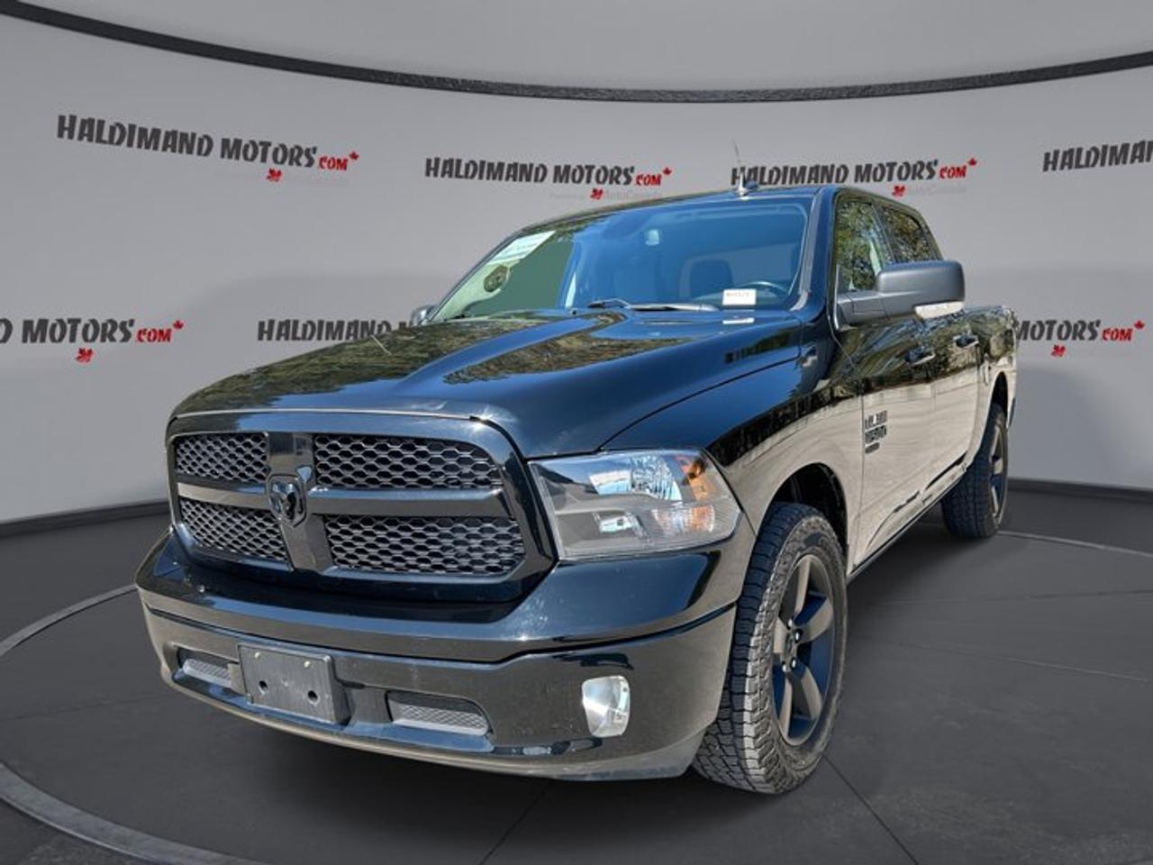 Meet the 2022 RAM 1500 Classic SLT Crew Cab 57 Box 4x4, a full-size pickup that fits work, family, and weekend plans with ease. This used truck is sold by Haldimand Motors Ltd. in Cayuga, finished in black with a grey interior, and shows 58,510 km.<br \><br \>With 4 full doors and a roomy Crew Cab layout, this 2022 RAM 1500 Classic SLT Crew Cab 57 Box 4x4 is built for real life. The automatic transmission keeps driving simple in town and calm on the highway. Add 4WD, and you are ready for changing Ontario weather.<br \><br \>Under the hood, this 2022 RAM 1500 Classic SLT Crew Cab 57 Box 4x4 uses a 3.6 L gas engine paired with an 8-speed automatic transmission. It delivers smooth power for daily driving, while still giving you the capability you want in a pickup.<br \><br \>For towing and hauling, this 2022 RAM 1500 Classic SLT Crew Cab 57 Box 4x4 is rated to tow up to 4,639 kg. A rear tow hook and a spare tire add peace of mind when the job runs long or the road gets rough.<br \><br \>TRUCK FEATURES<br \>   Towing capacity rated up to 4,639 kg <br \>   Four-Wheel Drive for tough conditions <br \>   Rear tow hook for recovery help <br \>   57 box for daily hauling <br \><br \>ADVANCED SAFETY FEATURES<br \>   Anti-Lock Braking System for controlled stops <br \>   Stability Control helps maintain secure handling <br \>   Side impact airbags for added protection <br \>   Tire Pressure Monitoring for safer driving <br \><br \>PERFORMANCE AND EFFICIENCY<br \>   3.6 L gas engine for versatility <br \>   8-speed automatic transmission shifts smoothly <br \>   Power steering for easy low-speed control <br \>   Four-Wheel Drive traction when roads change <br \><br \>COMFORT AND CONVENIENCE<br \>   Front air conditioning for cabin comfort <br \>   Heated front seats for cold mornings <br \>   Heated steering wheel adds winter comfort <br \>   Drivers side power seat adjustment <br \><br \>TECHNONOLGY AND CONNECTIVITY<br \>   Apple CarPlay for familiar phone control <br \>   Android Auto for easy app access <br \>   Bluetooth integration for hands-free calling <br \>   Satellite radio for more listening choice <br \><br \>CARGO SPACE<br \>   57 box suits tools and gear <br \>   Crew Cab adds in-cabin storage space <br \>   Power windows for quick drive-through stops <br \>   Tinted windows help reduce cabin glare <br \><br \>WHAT OTHER OWNERS LIKE<br \>   Confident 4WD traction in bad weather <br \>   Easy-to-use infotainment with phone integration <br \>   Comfortable ride for a full-size truck <br \>   Strong everyday towing and hauling ability <br \><br \>This 2022 RAM 1500 Classic SLT Crew Cab 57 Box 4x4s VIN is: 3C6RR7LG9NG177283.<br \><br \>WHY CHOOSE US? <br \><br \>Honest & Transparent Buying Experience: Weve been a trusted name in business since 1984.<br \><br \>STRAIGHTFORWARD PRICING:<br \>Our Advertised Price Includes:<br \>>>Safety Certification (No separate fee!)<br \>>>30-Day 100% Mechanical Warranty<br \>>>FREE Carfax History Report.<br \>>>No upcharge for paying cash.<br \>(Prices Exclude HST and Licensing Fees only.)<br \><br \>>>Browse 300+ vehicles all in ONE LOCATION<br \><br \>EASY FINANCING: Great rates & open loans<br \><br \>WE BUY CARS: Get Top Dollar for your trade-in, or sell us your vehicle for CASH! Even if you dont buy from us!<br \><br \>STOP BY TODAY<br \>Treat yourself - stop by Haldimand Motors Ltd. located at 42 Talbot St E, Cayuga, ON N0A 1E0 to make this car yours today!<br \><br \>https://www.haldimandmotors.com/used/stock-460121.html