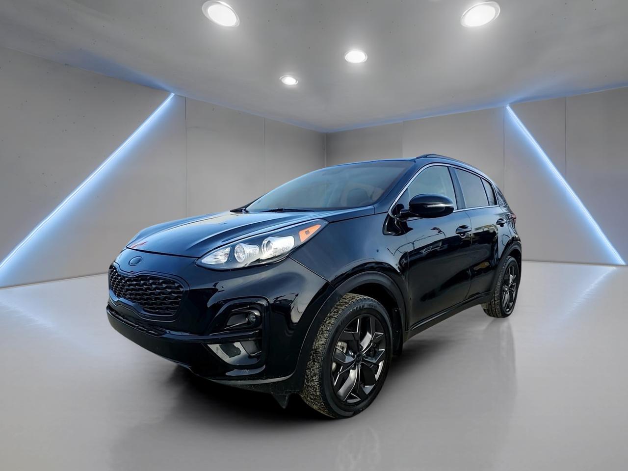 All Trades Accepted. In-house Financing Available. Flexible Payments and Zero Down Financing. All Credit Situations Accepted O.A.C

Meet the 2022 Kia Sportage LX AWD, a smart choice for Saskatoon drivers who want year-round confidence in a practical, easy-to-live-with SUV. Finished in Black with a Black interior, this used Sportage offers a clean, modern look with everyday functionality. With 145,888 km, an automatic transmission, and a 2.4 L unleaded engine, its ready for commuting, errands, and weekend trips.

The 2022 Kia Sportage LX AWD is built for real life. You get 4 doors for easy access, a comfortable cabin layout, and helpful features that make daily driving simpler. From cold mornings to busy parking lots, this SUV brings the right mix of traction, visibility, and convenience without overcomplicating things.

FEATURES OF THE Sportage LX AWD  
»» All-wheel drive for four-season confidence  
»» 2.4 L engine with automatic transmission  
»» Backup camera for easier reversing  
»» Heated front seats for cold days  

ADVANCED SAFETY FEATURES  
»» Anti-lock braking system for controlled stops  
»» Stability control helps maintain traction  
»» Driver and passenger front airbags included  
»» Side impact airbags for added protection  

PERFORMANCE AND EFFICIENCY  
»» 2.4 L unleaded engine for daily driving  
»» Automatic transmission for smooth operation  
»» 6-speed automatic with dual shift mode  
»» Power steering for easy low-speed turns  

COMFORT AND CONVENIENCE  
»» Front air conditioning for cabin comfort  
»» Heated front seats for winter commuting  
»» Power windows for quick adjustments  
»» Cruise control for relaxed highway drives  

TECHNONOLGY AND CONNECTIVITY  
»» Bluetooth integration for hands-free calling  
»» Steering wheel audio controls within reach  
»» Backup camera view when reversing  
»» Ambient lighting package adds cabin glow  

CARGO SPACE  
»» Rear trunk access for easy loading  
»» Four-door layout improves daily usability  
»» Rear spoiler adds practical finishing touch  
»» Tinted windows help reduce cabin glare  

WHAT OTHER OWNERS LIKE  
»» Confident feel from all-wheel drive  
»» Simple controls and easy daily operation  
»» Helpful visibility with backup camera  
»» Comfortable winter driving with heated seats  

WARRANTY  
Additional warranty information: Warranty - Additional informationnnBuy with confidence at Platinum Auto Sport in Saskatoon. We offer comprehensive extended warranty coverage on pre-owned vehicles, powered by SAL Warranty, including mechanical breakdown protection and extended manufacturer (bumper-to-bumper) coverage.nnOur protection options include:nnExtended Warranty PlansnnGuaranteed Asset Protection (GAP Insurance)nnCredit / Creditor Insurance (CAP)nnReplacement & Appearance ProtectionnnOEM ProgramsnnTheft Deterrent ProtectionnnLooking for used car financing in Saskatoon We make approvals simple with:nnIn-House Financing AvailablennOver 25 Trusted Lending PartnersnnSpecial Low-Rate Financing (O.A.C.)nnDealer Exclusive Financing IncentivesnnOnline Pre-Approval OptionsnnEvery vehicle includes:nnFull Vehicle History DisclosurennCompetitive, Transparent PricingnnTrade-Ins Welcome (Cars, Trucks, SUVs, Powersports, Boats & RVs)nnFree Delivery Anywhere in Western CanadannFor the best selection of quality used cars, trucks, and SUVs in Saskatoon, choose Platinum Auto Sport. Call or text Fernando (General Manager) at (639) 471-1839 or visit www.platinumautosport.comntoday.nnConditions apply. Contact dealer for details.n

This 2022 Kia Sportage LX AWDs VIN is: Kndpmcac2n7978625.

Pre-Owned Vehicle Warranty & Financing ? Platinum Auto Sport Saskatoon

Buy with confidence at Platinum Auto Sport in Saskatoon. We offer comprehensive extended warranty coverage on pre-owned vehicles, powered by SAL Warranty, including mechanical breakdown protection and extended manufacturer (bumper-to-bumper) coverage.

Our protection options include:

Extended Warranty Plans

Guaranteed Asset Protection (GAP Insurance)

Credit / Creditor Insurance (CAP)

Replacement & Appearance Protection

OEM Programs

Theft Deterrent Protection

Looking for used car financing in Saskatoon? We make approvals simple with:

In-House Financing Available

Over 25 Trusted Lending Partners

Special Low-Rate Financing (O.A.C.)

Dealer Exclusive Financing Incentives

Online Pre-Approval Options

Every vehicle includes:

Full Vehicle History Disclosure

Competitive, Transparent Pricing

Trade-Ins Welcome (Cars, Trucks, SUVs, Powersports, Boats & RVs)

Free Delivery Anywhere in Western Canada

For the best selection of quality used cars, trucks, and SUVs in Saskatoon, choose Platinum Auto Sport. Call or text Fernando (General Manager) at (639) 471-1839 or visit www.platinumautosport.com
 today.

Conditions apply. Contact dealer for details.