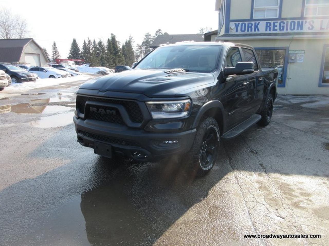 2023 RAM 1500 LOADED REBEL-PACKAGE 5 PASSENGER 5.7L - V8.. 4X4.. CREW-CAB.. SHORTY.. NAVIGATION.. SUNROOF.. LEATHER.. HEATED SEATS & WHEEL.. BACK-UP CAMERA.. Photo