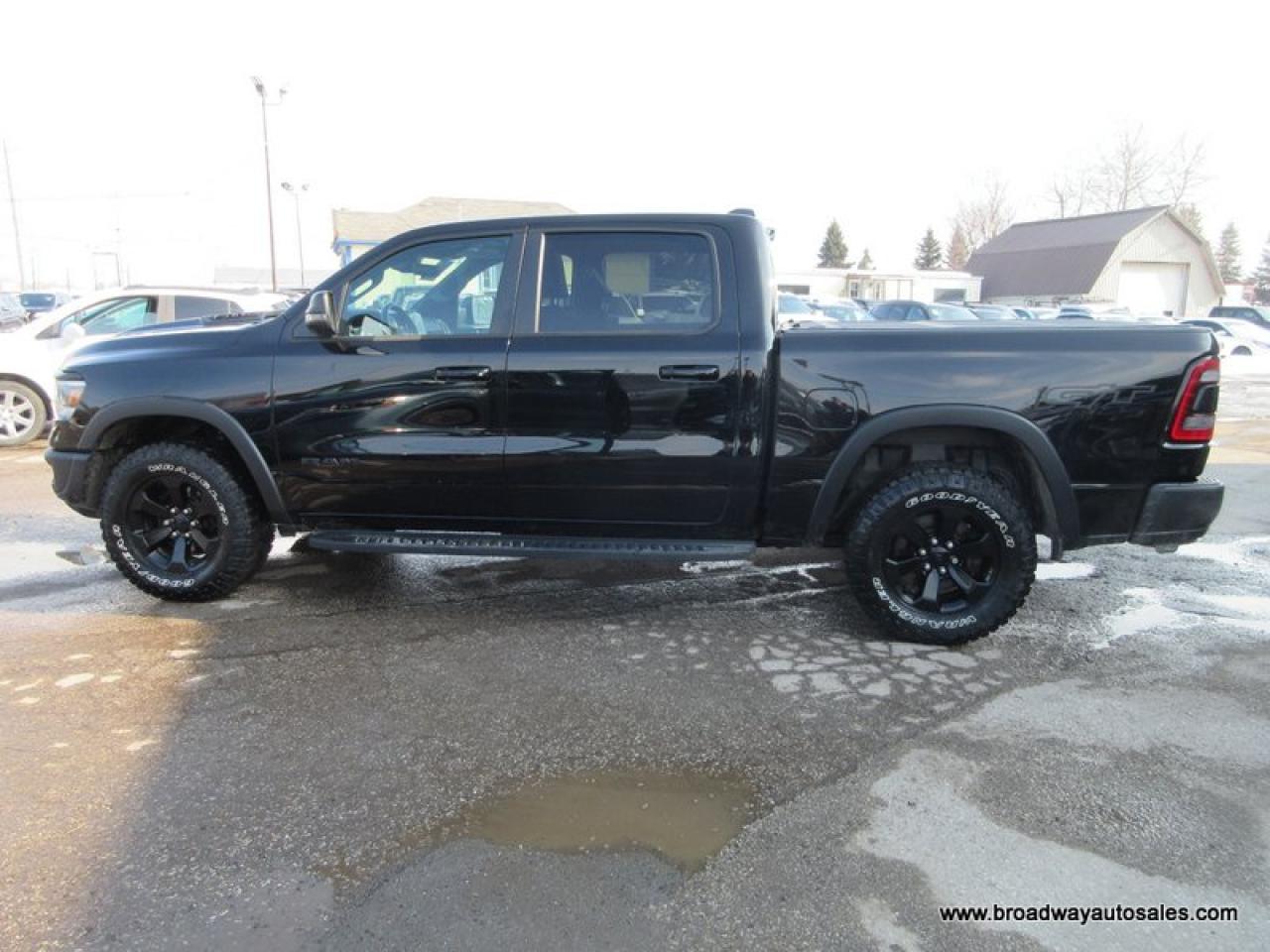 2023 RAM 1500 LOADED REBEL-PACKAGE 5 PASSENGER 5.7L - V8.. 4X4.. CREW-CAB.. SHORTY.. NAVIGATION.. SUNROOF.. LEATHER.. HEATED SEATS & WHEEL.. BACK-UP CAMERA.. Photo