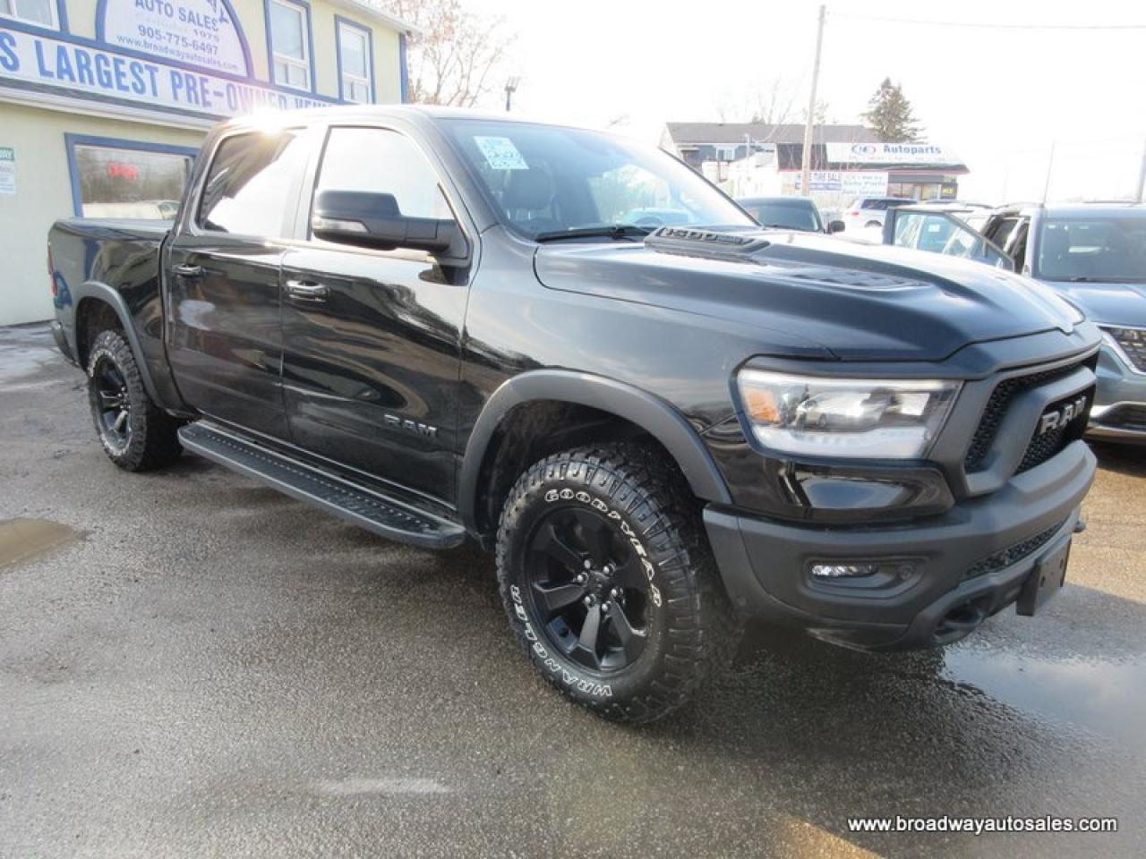 2023 RAM 1500 LOADED REBEL-PACKAGE 5 PASSENGER 5.7L - V8.. 4X4.. CREW-CAB.. SHORTY.. NAVIGATION.. SUNROOF.. LEATHER.. HEATED SEATS & WHEEL.. BACK-UP CAMERA.. Photo