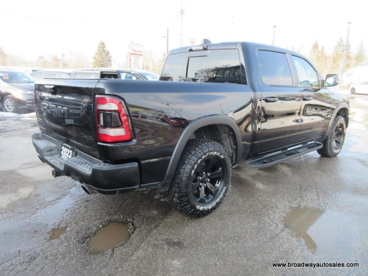 2023 RAM 1500 LOADED REBEL-PACKAGE 5 PASSENGER 5.7L - V8.. 4X4.. CREW-CAB.. SHORTY.. NAVIGATION.. SUNROOF.. LEATHER.. HEATED SEATS & WHEEL.. BACK-UP CAMERA.. Photo