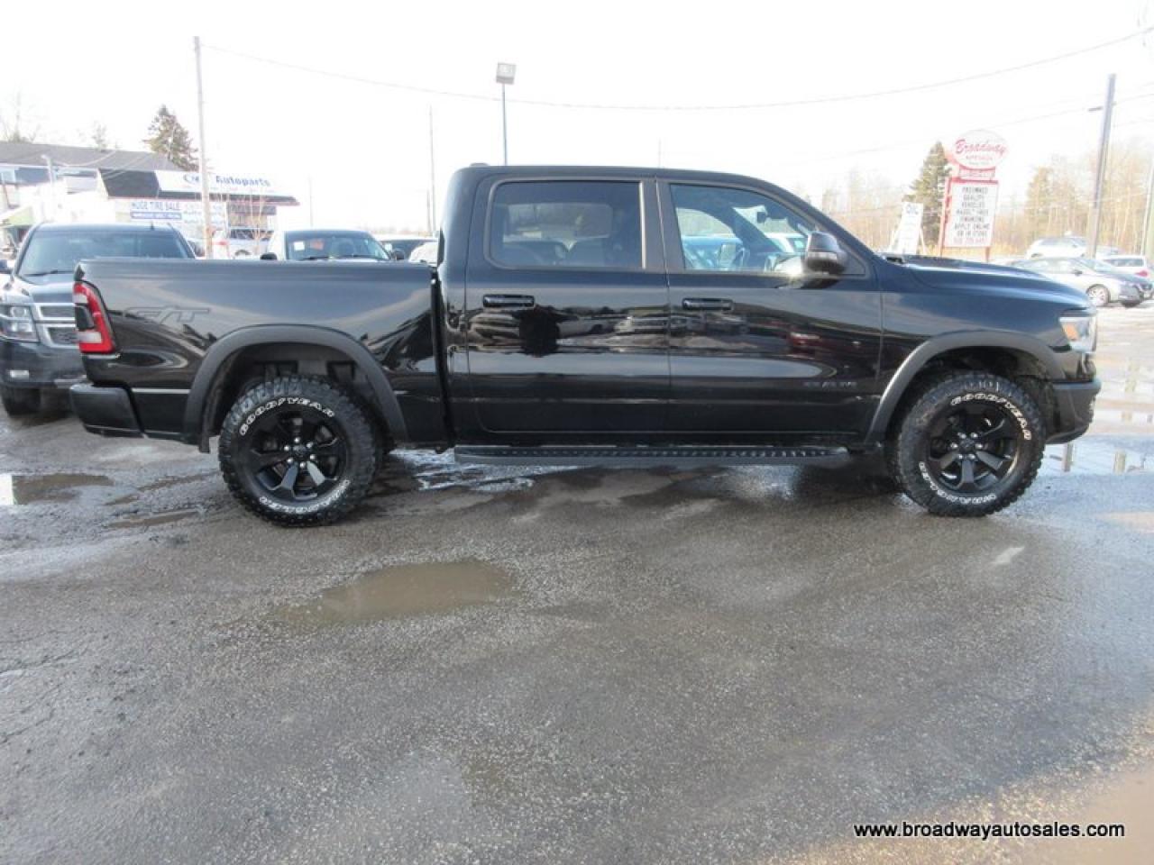 2023 RAM 1500 LOADED REBEL-PACKAGE 5 PASSENGER 5.7L - V8.. 4X4.. CREW-CAB.. SHORTY.. NAVIGATION.. SUNROOF.. LEATHER.. HEATED SEATS & WHEEL.. BACK-UP CAMERA.. Photo