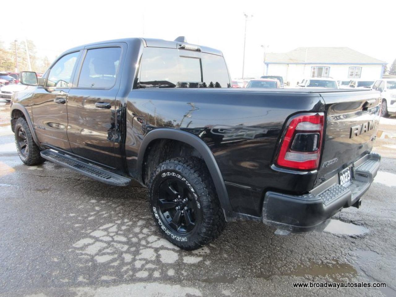 2023 RAM 1500 LOADED REBEL-PACKAGE 5 PASSENGER 5.7L - V8.. 4X4.. CREW-CAB.. SHORTY.. NAVIGATION.. SUNROOF.. LEATHER.. HEATED SEATS & WHEEL.. BACK-UP CAMERA.. Photo