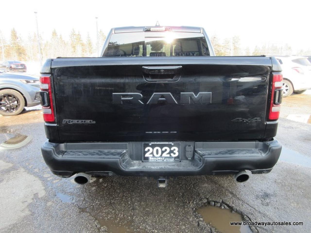 2023 RAM 1500 LOADED REBEL-PACKAGE 5 PASSENGER 5.7L - V8.. 4X4.. CREW-CAB.. SHORTY.. NAVIGATION.. SUNROOF.. LEATHER.. HEATED SEATS & WHEEL.. BACK-UP CAMERA.. Photo