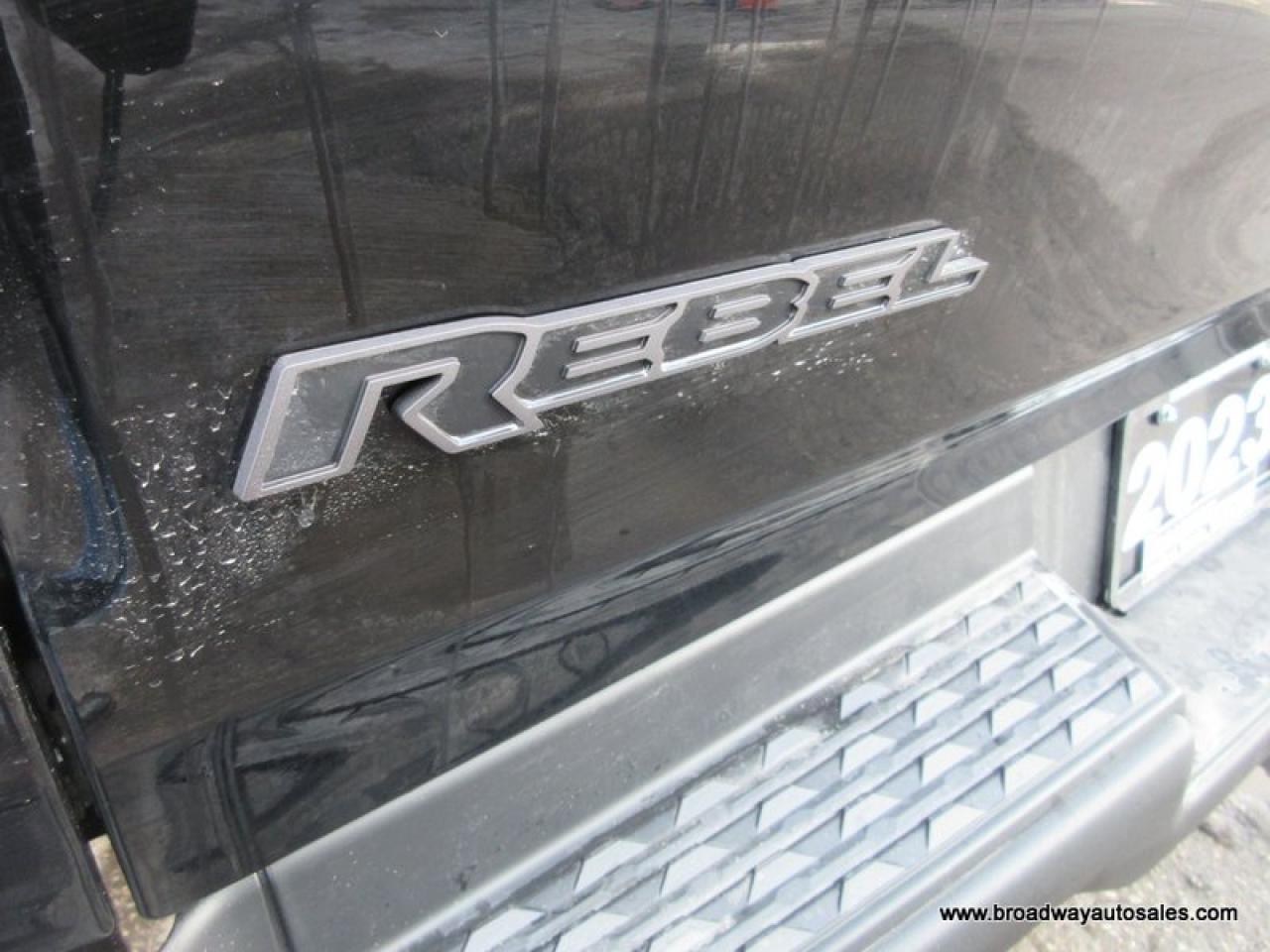 2023 RAM 1500 LOADED REBEL-PACKAGE 5 PASSENGER 5.7L - V8.. 4X4.. CREW-CAB.. SHORTY.. NAVIGATION.. SUNROOF.. LEATHER.. HEATED SEATS & WHEEL.. BACK-UP CAMERA.. Photo