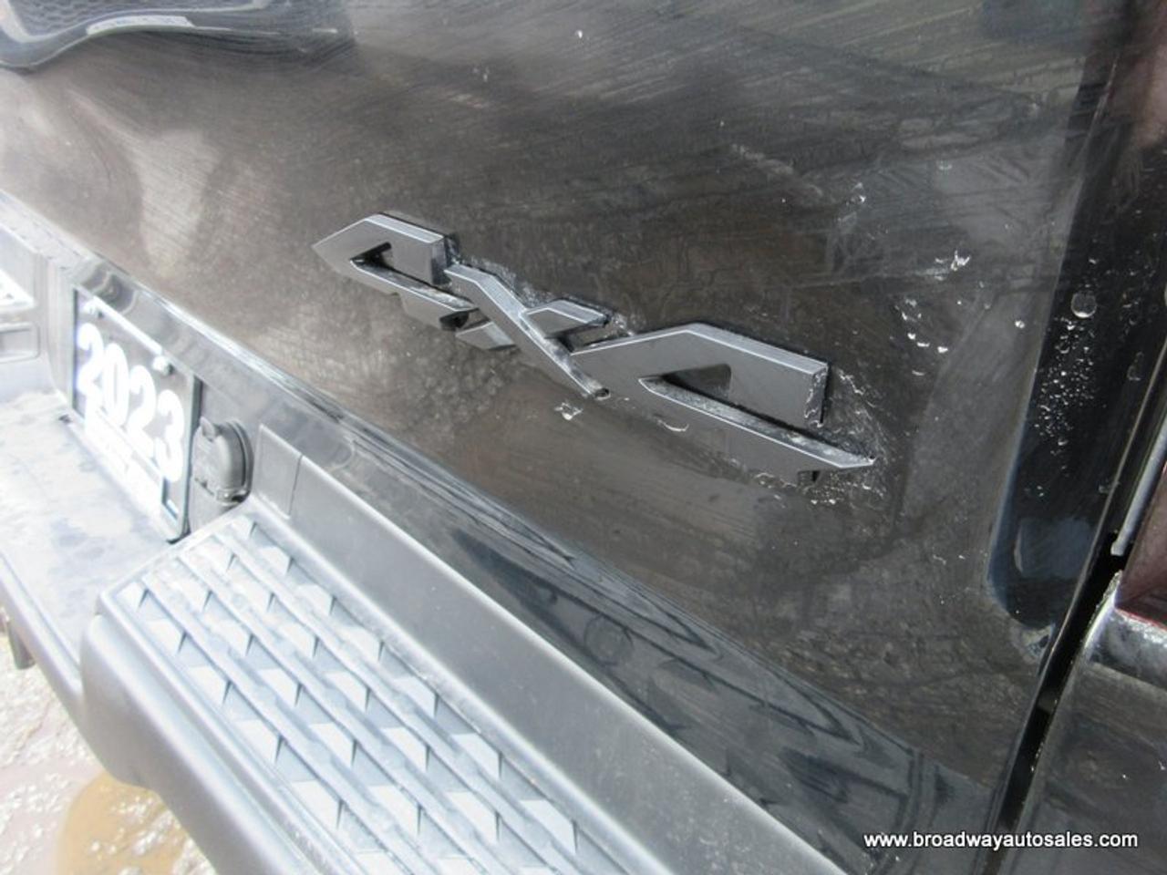 2023 RAM 1500 LOADED REBEL-PACKAGE 5 PASSENGER 5.7L - V8.. 4X4.. CREW-CAB.. SHORTY.. NAVIGATION.. SUNROOF.. LEATHER.. HEATED SEATS & WHEEL.. BACK-UP CAMERA.. Photo