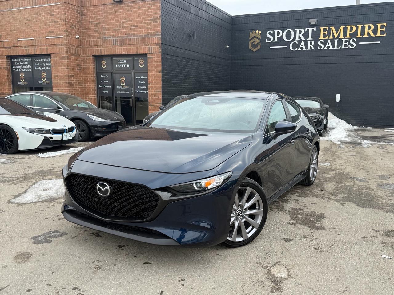 *FULLY LOADED* *MINT CONDITION* *HEATED SEATS* *CERTIFIED* *AUTOMATIC* *REVERSE CAMERA* *BLIND SPOT MONITORING* Safety Certified NOT included in Price | By Appointment Only: 416-606-7758 Year: 2024 Price: $20,880+HST Make: Mazda3 Model: Sport Trim: GS Auto FWD Kms: 39,789 Sport empire cars Offering a beautiful Mazda3 Sport GS Auto Sport with only 39,789 kms!! For the affordable price of $20,880+HST and licensing. Beautiful Blue exterior with a Black fabric interior. Vehicle comes SAFETY CERTIFIED!! Professionally detailed and ready to go. Perfect combination of reliability, comfort and luxury. Buy with Trust with an Ontario registered dealer. VIN: JM1BPALM0R1704196