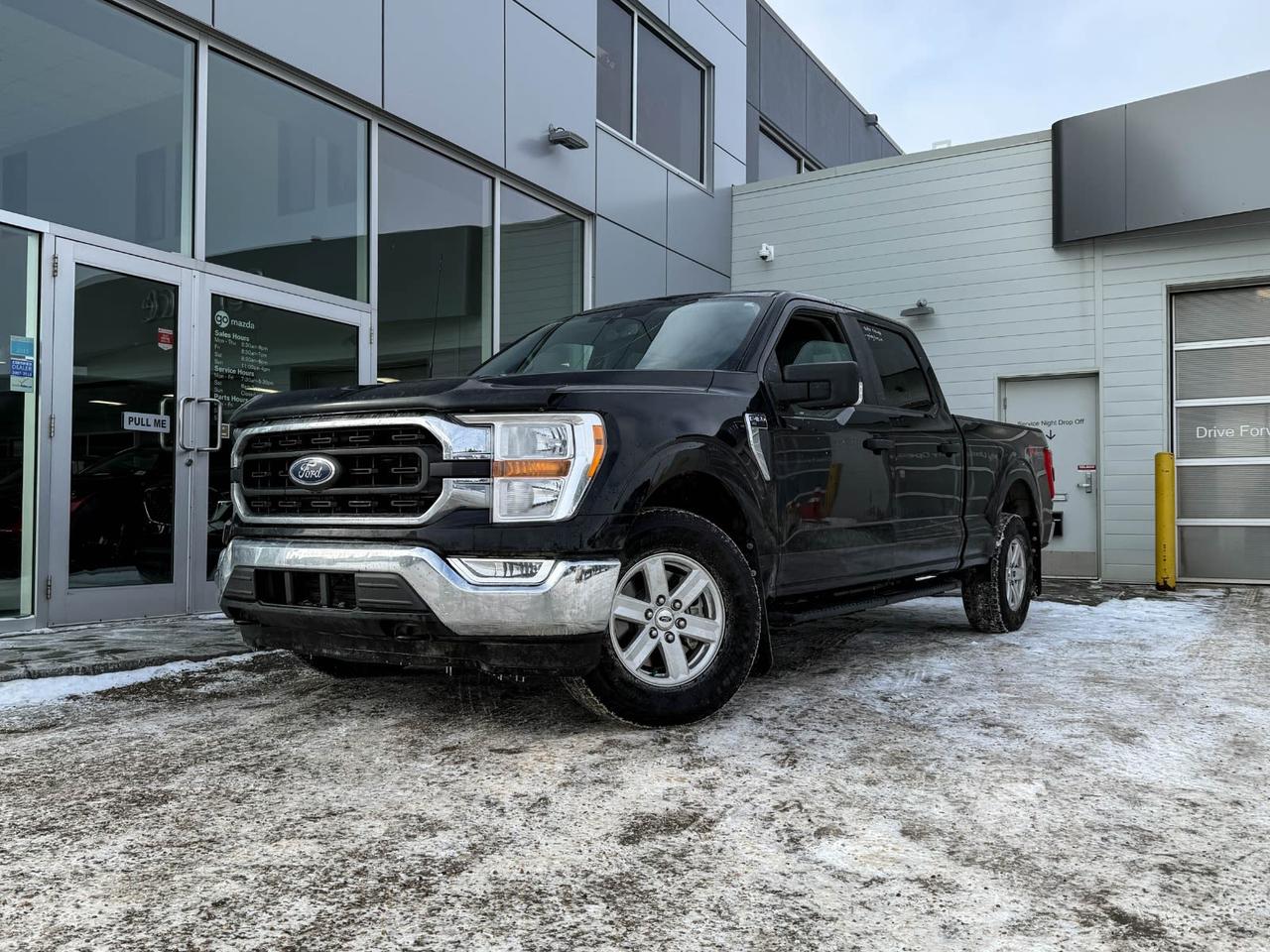 Discover the tough and versatile 2022 Ford F-150 XLT 4WD SuperCrew with a sleek Grey exterior and comfortable Black interior. Powered by a robust 3.5L V6 EcoBoost engine paired with a smooth 10-speed automatic transmission, this truck is ready for any task. Equipped with the FX4 Off-Road Package, trailer tow features including Pro Trailer Backup Assist and integrated trailer brake control, plus Hill Descent Control, its built for both off-road adventures and heavy-duty towing. Enjoy modern convenience with SYNC 4, remote start, 8-way power drivers seat, and LED side-mirror spotlights. Safety and comfort abound, making it the perfect pre-owned truck to elevate your driving experience. Test drive it today at Go Mazda!Go Mazda is an AMVIC licensed business.Clean CarFax