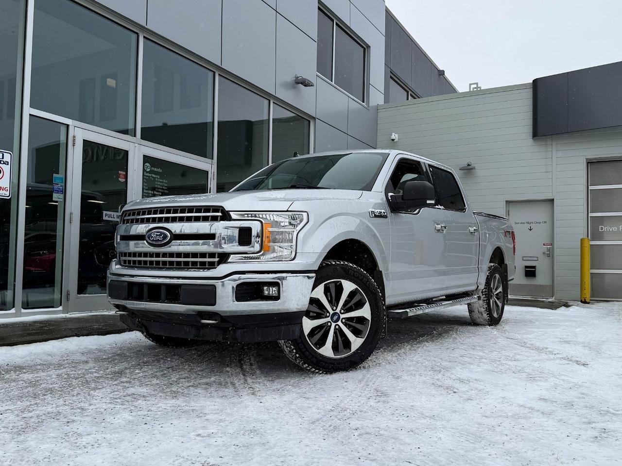 Discover the rugged reliability of this pre-owned 2019 Ford F-150 XLT 4WD SuperCrew 5.5 Box in sleek Silver with a comfortable Gray interior. Powered by a 3.5L V6 EcoBoost engine and backed by a smooth 10-speed automatic transmission, this truck offers impressive performance and towing capability with its Max Trailer Tow Package and integrated trailer brake controller. Enjoy enhanced functionality with features like Pro Trailer Backup Assist, Tailgate Step, and the versatile BoxLink Cargo Management System. Inside, stay connected and comfortable with SYNC 3, an 8-way power drivers seat, leather-wrapped steering wheel, and power-adjustable pedals. Safety is a priority, featuring a Reverse Sensing System and advanced stability controls. Ready for work or play, this F-150 blends power, technology, and convenience into a versatile package. Come test drive it today at Go Mazda and take your driving experience to the next level!Vehicle has a $3156 claim on the Carfax history reportGo Mazda is an AMVIC licenced buisness