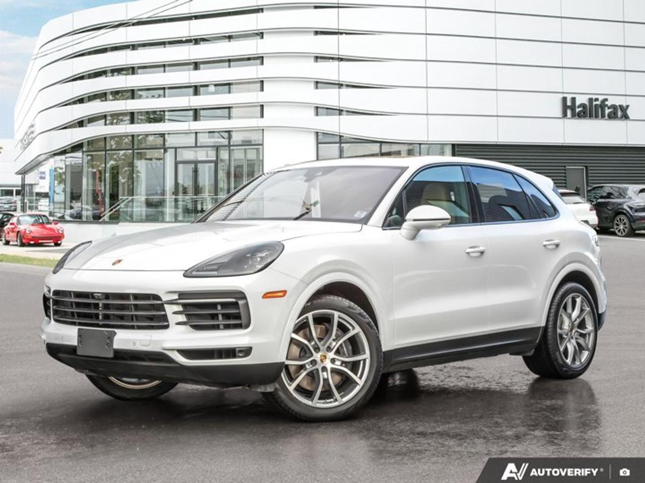 *Now available at Porsche of Halifax*, this *2023 Porsche Cayenne* is finished in *Carrara White Metallic* with a *Leather Interior in Black/Mojave Beige*. The vehicle is configured with Premium Package equipment and a range of comfort, lighting, and driver-assistance features.*Warranty Included with this Porsche CPO Program Vehicle:*  * *2 years of Unlimited-Kilometer Porsche Approved Warranty Coverage, starting either (A) The day after the New Vehicle Limited Warranty expires or (B) The day you take Delivery (if the New Vehicle Limited Warranty is expired)*  * *A 111-Point Inspection performed by Porsche-trained technicians, using only genuine Porsche Parts.*  * *For the duration of the Warranty period, 24-hour Porsche Roadside Assistance, including towing, emergency fuel delivery, lock out service, trip interruption coverage, and more.*==== Performance & Driving ====  *   *Automatic transmission*  *   *Sport Chrono Package* -- adds selectable drive modes and sharper throttle response  *   *Power Steering Plus* -- reduces steering effort at low speeds while maintaining stability at highway speeds  *   *21 Cayenne Exclusive Design wheels with all-season tires* -- balanced for year-round usability  *   *Sport tailpipes in Black* -- subtle exterior detail==== Interior & Comfort ====  *   *Leather interior in Black/Mojave Beige* -- two-tone finish for a lighter cabin feel  *   *Adaptive Sport Seats Plus (18-way) with memory* -- multiple seating adjustments for driver comfort  *   *Heated and ventilated front and rear seats* -- improves comfort across seasons  *   *4-zone climate control* -- individualized temperature settings for all passengers  *   *Panoramic roof system* -- increases natural light  *   *Power sunblind for rear side windows* -- added passenger comfort and privacy  *   *Soft close doors* -- smoother door operation  *   *Ionizer* -- enhances interior air quality  *   *Heated windshield* -- improved winter visibility  *   *Steering column casing in leather & Porsche crests on headrests* -- interior detailing==== Lighting & Driver Assistance ====  *   *LED headlights in Black with Porsche Dynamic Light System (PDLS)* -- adaptive lighting response  *   *Lane Change Assist (LCA)* -- monitors adjacent lanes during highway driving  *   *Surround View camera system* -- multiple camera angles to assist with parking  *   *Auto-dimming mirrors* -- reduces glare from trailing traffic==== Exterior Details ====  *   *Window trim in High Gloss Black*  *   *Exterior mirror lower trims painted in exterior colour*  *   *Clear LED taillights*  *   *Exclusive Design fuel cap*  *   *Under-door puddle light projectors*This Cayenne is specified with a strong emphasis on comfort, visibility, and passenger convenience, paired with 21-inch wheels and Sport Chrono for a balanced daily driving configuration. Connect with us for more details or to arrange a test-drive with a Porsche Brand Ambassador at *www.porscheofhalifax.com *or *902-453-8800*.