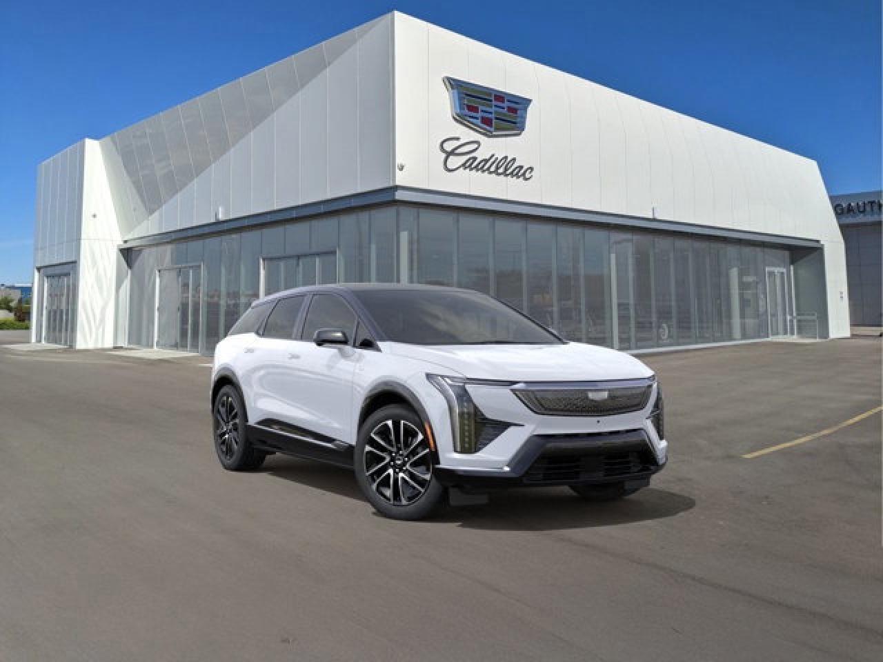 The all-electric 2026 Cadillac OPTIQ Premium Sport combines sporty aesthetics with premium comfort, offering a refined electric SUV experience. It comes standard with ventilated and lumbar-massaging front seats, heated rear outboard seats, and 8-way power front passenger seating with memory. On the tech and styling front, it features choreographed LED lighting (including head- and tail-lamps), a contrasting colour on the roof, a heads-up display, rear cargo cover, and 20-inch dark-android wheels paired with low-profile tires.