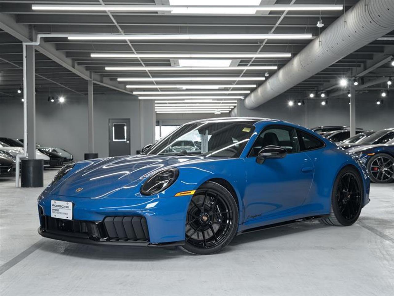 ***Leasing Options Available on Certified Pre-Owned Porsches***  The Porsche that you’ve always wanted. This 2025 911 Carrera 4 GTS has a Clean CarFax Report. With Lugano Blue ($1,710), Premium Package ($5,250), Electric Slide/Tilt Sunroof in Glass ($2,280), Exterior Package in High Gloss Black ($3,670), Exclusive Design Fuel Cap ($190), Power Steering Plus ($350), Front Axle Lift System ($3,400), Brake Calipers in High Gloss Black ($1,030), Deviated Stitching Interior Package ($3,860), Porsche Crest on Headrests (Front) ($350), Adaptive Sport Seats Plus (18-way) with Memory Package ($3,460),  Rear Seats, Heated GT Sport Steering Wheel in Leather with Trim in Matte Carbon Fiber ($550), Interior Trim Inlays in Matte Carbon Fiber and Trim in Black ($960), Ventilated Seats (Front) ($960), Sport Chrono Stopwatch Dial and Digital Tachometer in Arctic Blue ($720), Steering Column Casing in Leather i.c.w. Memory Package ($600), Preparation for Deviated Stitching - Speed Blue, Color Selection for Stitching in Deviated Color - Speed Blue, HD-Matrix Design LED Headlights in Black ($3,730), and Under Door Puddle Light Projectors ($190), this is the car for you! Look for the Porsche Approved seal when buying a pre-owned Porsche. Porsche Approved Pre-Owned Cars are inspected in compliance with our 111-point checklist and any work required is performed using only 100% Porsche Genuine Parts. As proof of the trust that we have in the quality of our vehicles, every certified pre-owned car comes with a minimum of 24 months Porsche Approved Warranty and Porsche Roadside Assistance. The Porsche Approved Warranty covers all components of your Porsche and offers the same level of security as our new car warranty. Luxury Tax is not charged on Certified Pre-Owned vehicles. Call us at 613-749-4275 and ask to speak to one of our Porsche Brand Executives. Serving the Ottawa & Gatineau region. *** Options de location disponibles pour les Porsche doccasion certifiées *** La Porsche de vos rêves. Cette voiture 2025 911 Carrera 4 GTS a un bon rapport d’historique de véhicule de CarFax. Grâce à Lugano Blue ($1,710), Premium Package ($5,250), Electric Slide/Tilt Sunroof in Glass ($2,280), Exterior Package in High Gloss Black ($3,670), Exclusive Design Fuel Cap ($190), Power Steering Plus ($350), Front Axle Lift System ($3,400), Brake Calipers in High Gloss Black ($1,030), Deviated Stitching Interior Package ($3,860), Porsche Crest on Headrests (Front) ($350), Adaptive Sport Seats Plus (18-way) with Memory Package ($3,460),  Rear Seats, Heated GT Sport Steering Wheel in Leather with Trim in Matte Carbon Fiber ($550), Interior Trim Inlays in Matte Carbon Fiber and Trim in Black ($960), Ventilated Seats (Front) ($960), Sport Chrono Stopwatch Dial and Digital Tachometer in Arctic Blue ($720), Steering Column Casing in Leather i.c.w. Memory Package ($600), Preparation for Deviated Stitching - Speed Blue, Color Selection for Stitching in Deviated Color - Speed Blue, HD-Matrix Design LED Headlights in Black ($3,730), and Under Door Puddle Light Projectors ($190), cette voiture est parfaite pour vous! Trouvez le sceau d’approbation de Porsche lorsque vous achetez une Porsche d’occasion. Les voitures d’occasion approuvées par Porsche sont inspectées conformément à notre liste de vérification de 111 points. Tout travail requis est effectué en utilisant uniquement des pièces d’origine Porsche. Comme preuve de la confiance que nous avons dans la qualité de nos véhicules, chaque voiture d’occasion certifiée fait l’objet d’une garantie d’au moins 24 mois approuvée par Porsche et de l’assistance routière Porsche. La garantie approuvée par Porsche couvre tous les composants de votre Porsche et offre le même niveau de sécurité que notre garantie pour les véhicules neufs. La taxe de luxe n’est pas appliquée aux véhicules d’occasion certifiés. Appelez-nous au 613-749-4275 pour parler à l’un de nos directeurs de marque Porsche. Au service de la région d’Ottawa et du Gatineau.