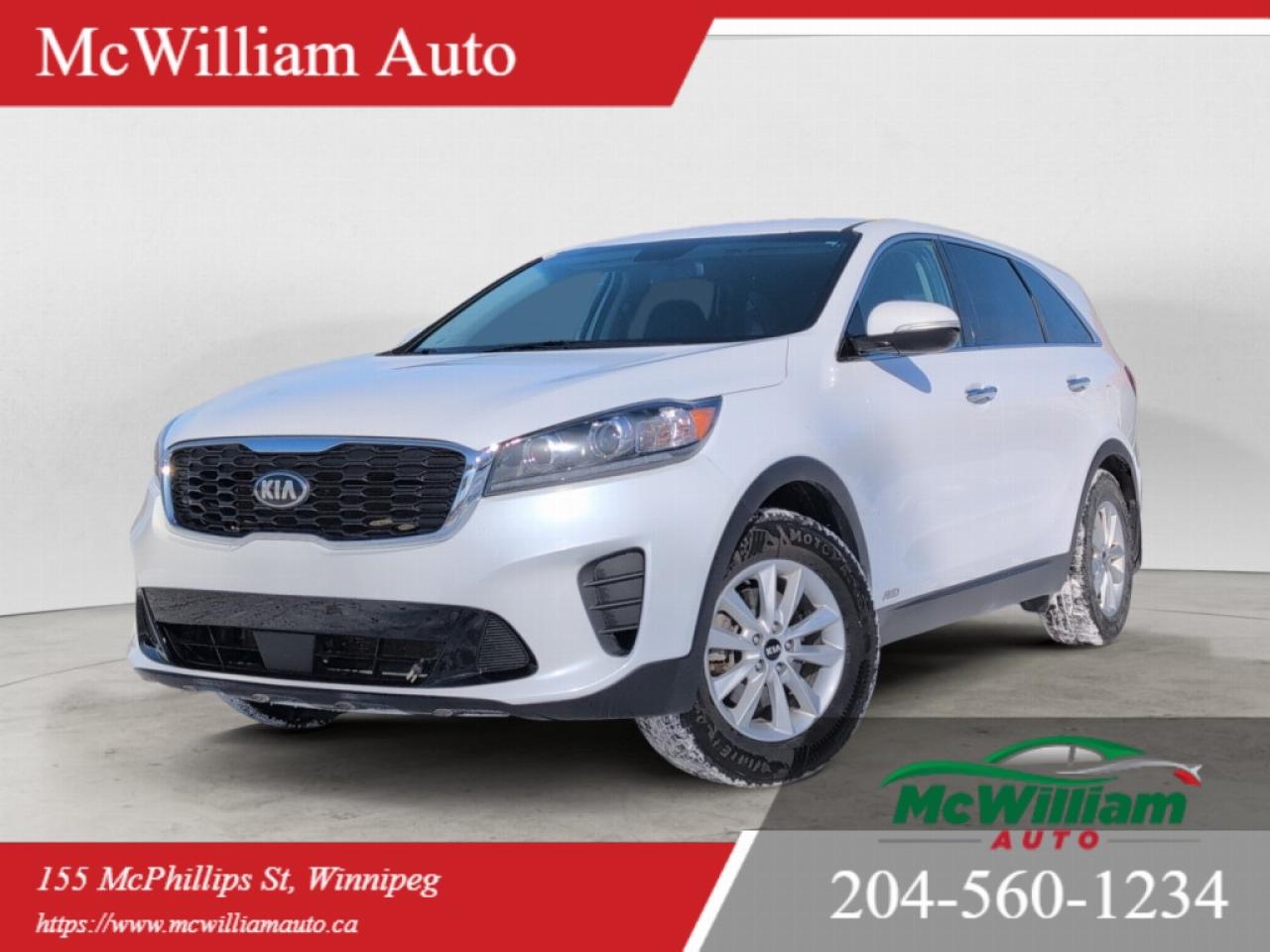 <br> 2020 Kia Sorento LX WhiteWhite exterior 2020 Kia Sorento LX. Midsize SUV with seating for up to five passengers and a spacious rear cargo area. Four-door configuration with rear liftgate access.Interior features include cloth seating surfaces with heated front seats and a heated steering wheel. Driver-focused layout with easy-to-reach controls and a multifunction steering wheel.Technology includes a touchscreen infotainment system with Apple CarPlay and Android Auto compatibility for smartphone integration, allowing access to navigation, calls, messaging, and media apps. Equipped with a rear backup camera for enhanced visibility while reversing.Convenience features include keyless entry for simplified vehicle access.Safety and driver-assist features include Blind Spot Monitoring (BSM) to help detect vehicles in adjacent lanes.Drivetrain includes a locking rear differential to assist with traction in low-grip conditions.Key Features:<br><br> <ul><li>White exterior</li><li>Heated front seats</li><li>Heated steering wheel</li><li>Apple CarPlay</li><li>Android Auto</li><li>Blind Spot Monitoring</li><li>Locking rear differential</li><li>Keyless entry</li><li>Backup camera</li></ul><br><br> IMPORTANT DISCLAIMER : This vehicle is a used vehicle, all the features and information may not be accurate from the descriptions above, please check the <br><br> <br><br>