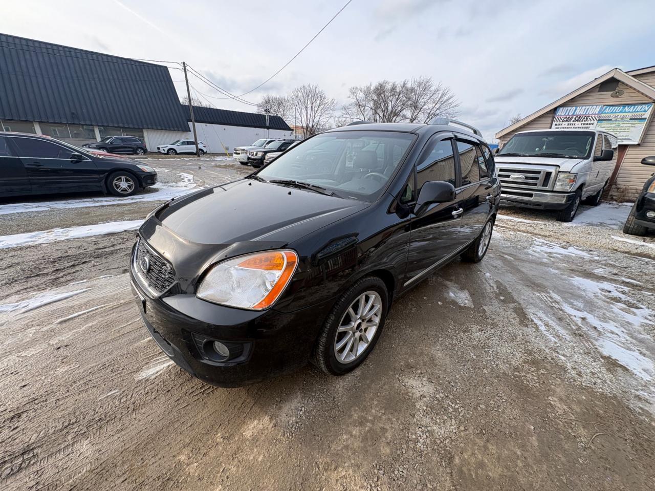 2011 Kia Rondo EX V6 – 7 Passenger with Safety Included and 1-Year Powertrain Warranty Photo