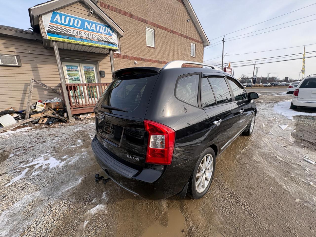 2011 Kia Rondo EX V6 – 7 Passenger with Safety Included and 1-Year Powertrain Warranty Photo