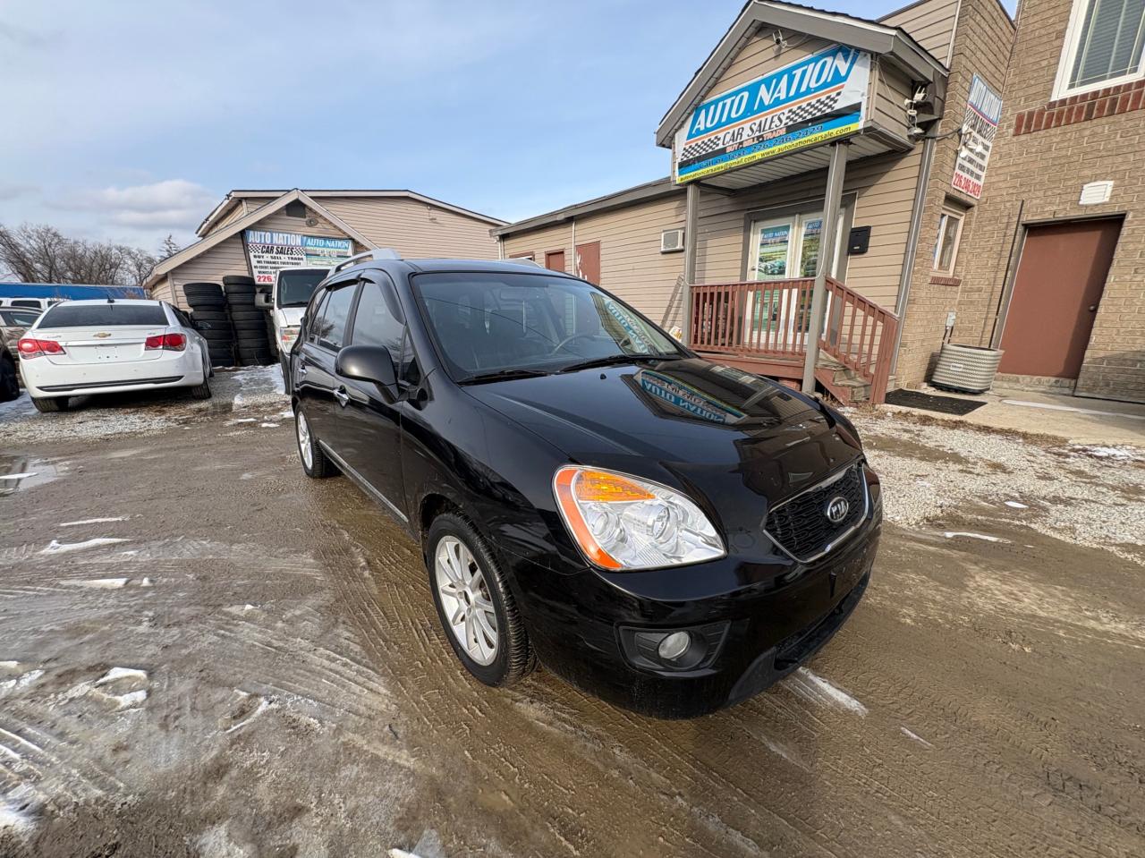 2011 Kia Rondo EX V6 – 7 Passenger with Safety Included and 1-Year Powertrain Warranty Photo