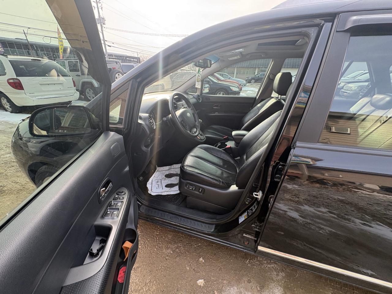 2011 Kia Rondo EX V6 – 7 Passenger with Safety Included and 1-Year Powertrain Warranty Photo