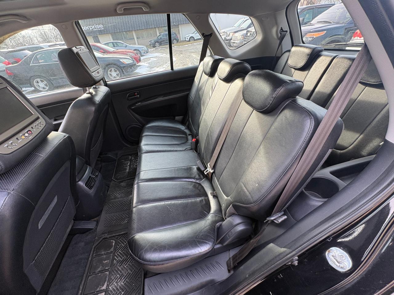 2011 Kia Rondo EX V6 – 7 Passenger with Safety Included and 1-Year Powertrain Warranty Photo