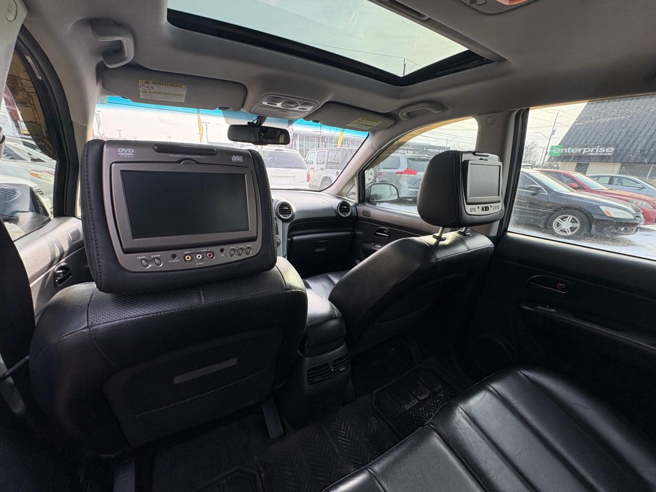 2011 Kia Rondo EX V6 – 7 Passenger with Safety Included and 1-Year Powertrain Warranty Photo