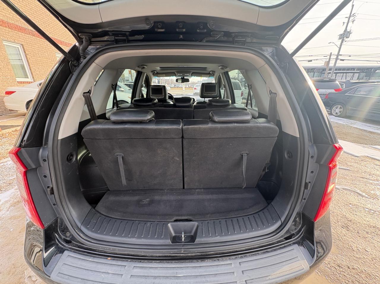 2011 Kia Rondo EX V6 – 7 Passenger with Safety Included and 1-Year Powertrain Warranty Photo