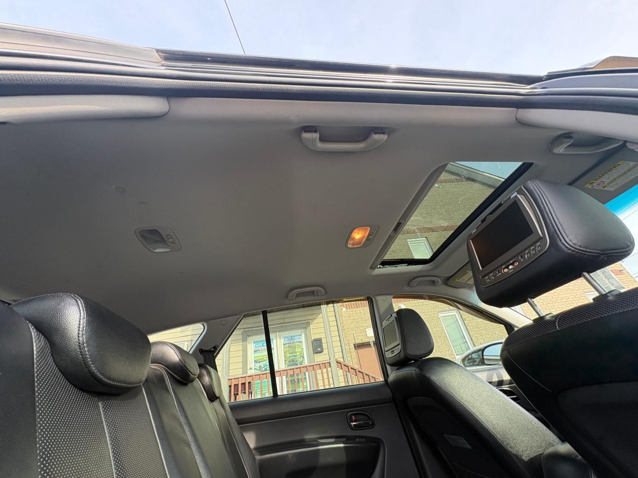 2011 Kia Rondo EX V6 – 7 Passenger with Safety Included and 1-Year Powertrain Warranty Photo