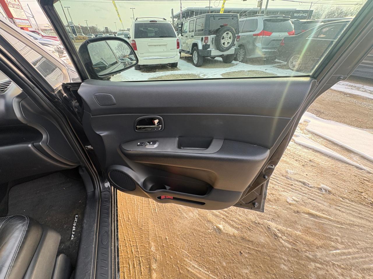 2011 Kia Rondo EX V6 – 7 Passenger with Safety Included and 1-Year Powertrain Warranty Photo