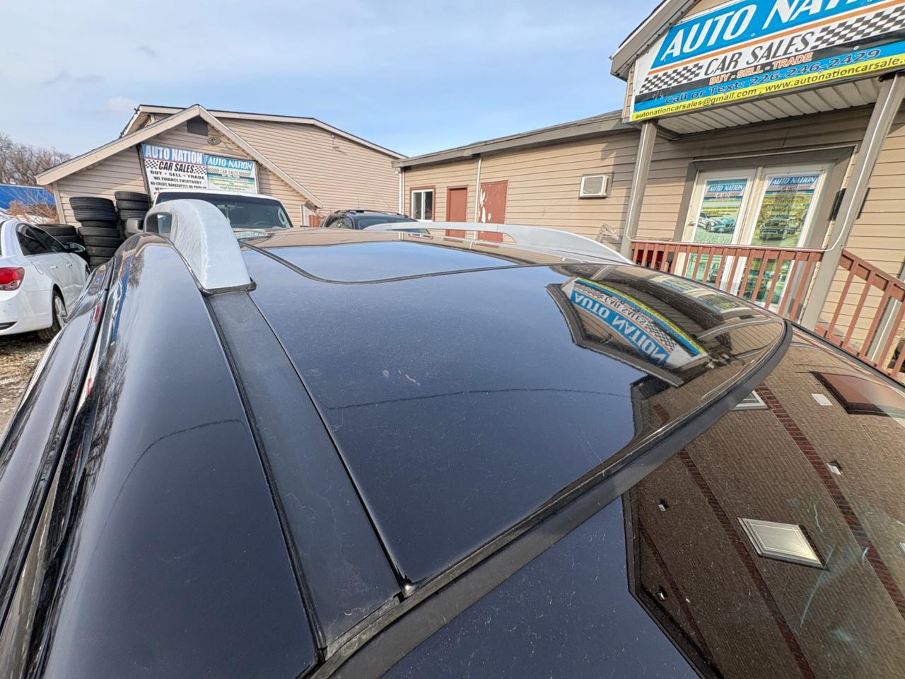 2011 Kia Rondo EX V6 – 7 Passenger with Safety Included and 1-Year Powertrain Warranty Photo