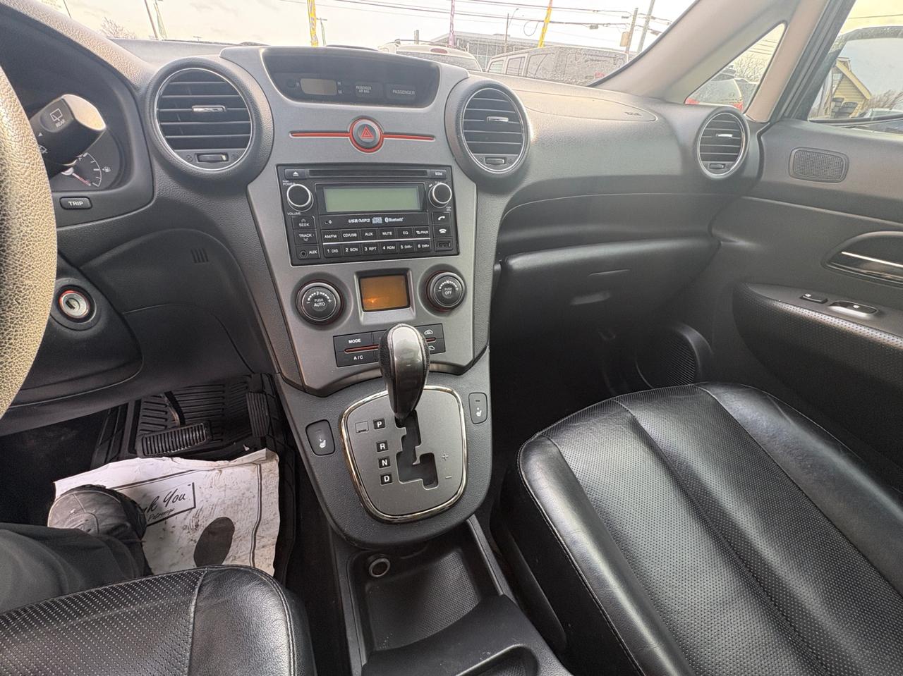 2011 Kia Rondo EX V6 – 7 Passenger with Safety Included and 1-Year Powertrain Warranty Photo