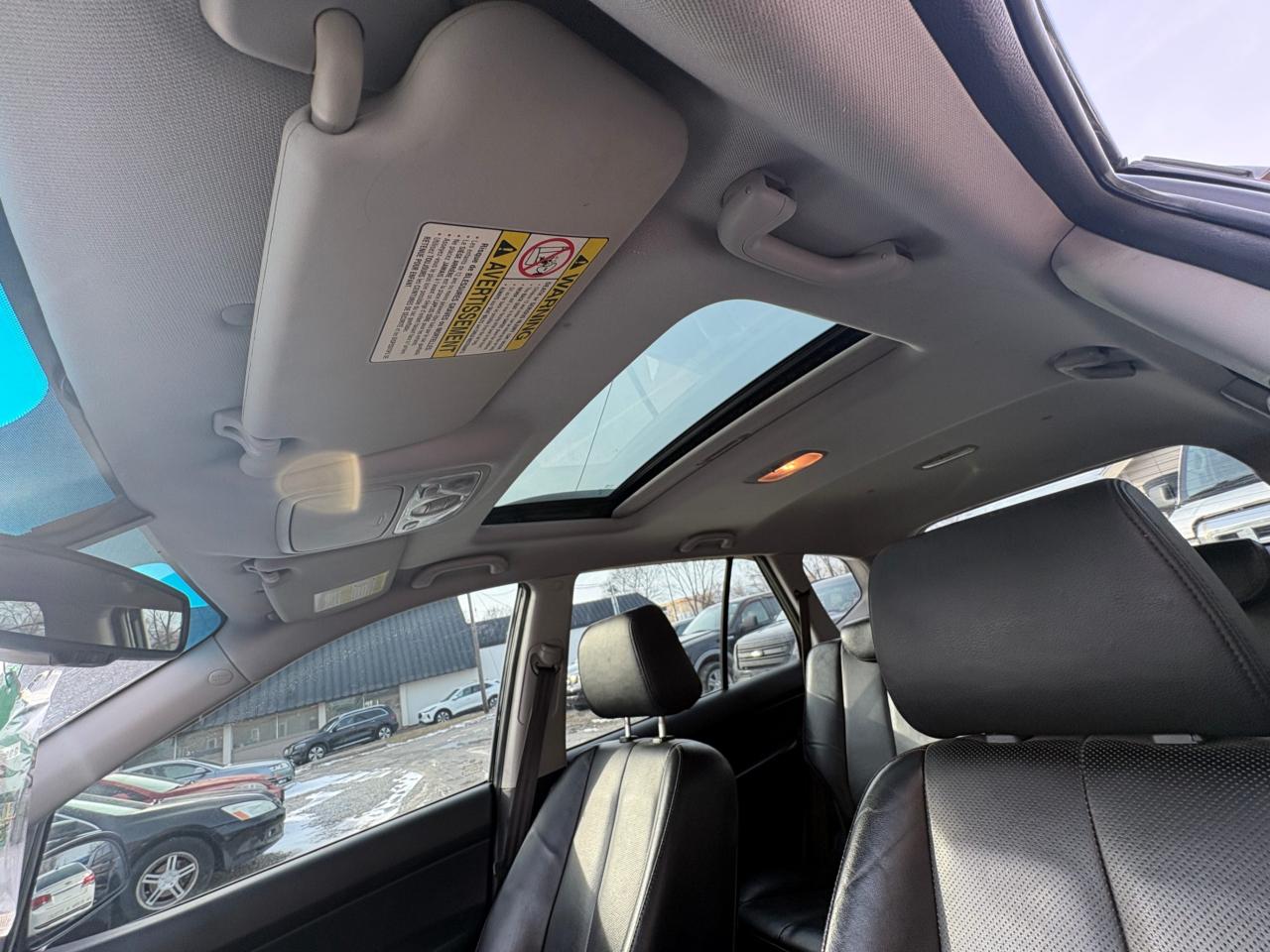 2011 Kia Rondo EX V6 – 7 Passenger with Safety Included and 1-Year Powertrain Warranty Photo