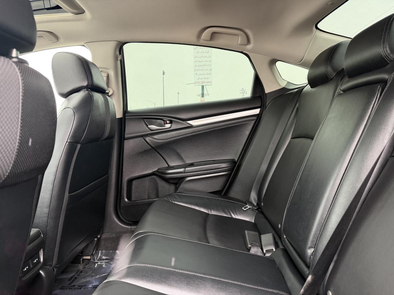 2021 Honda Civic Touring Sedan CVT Photo