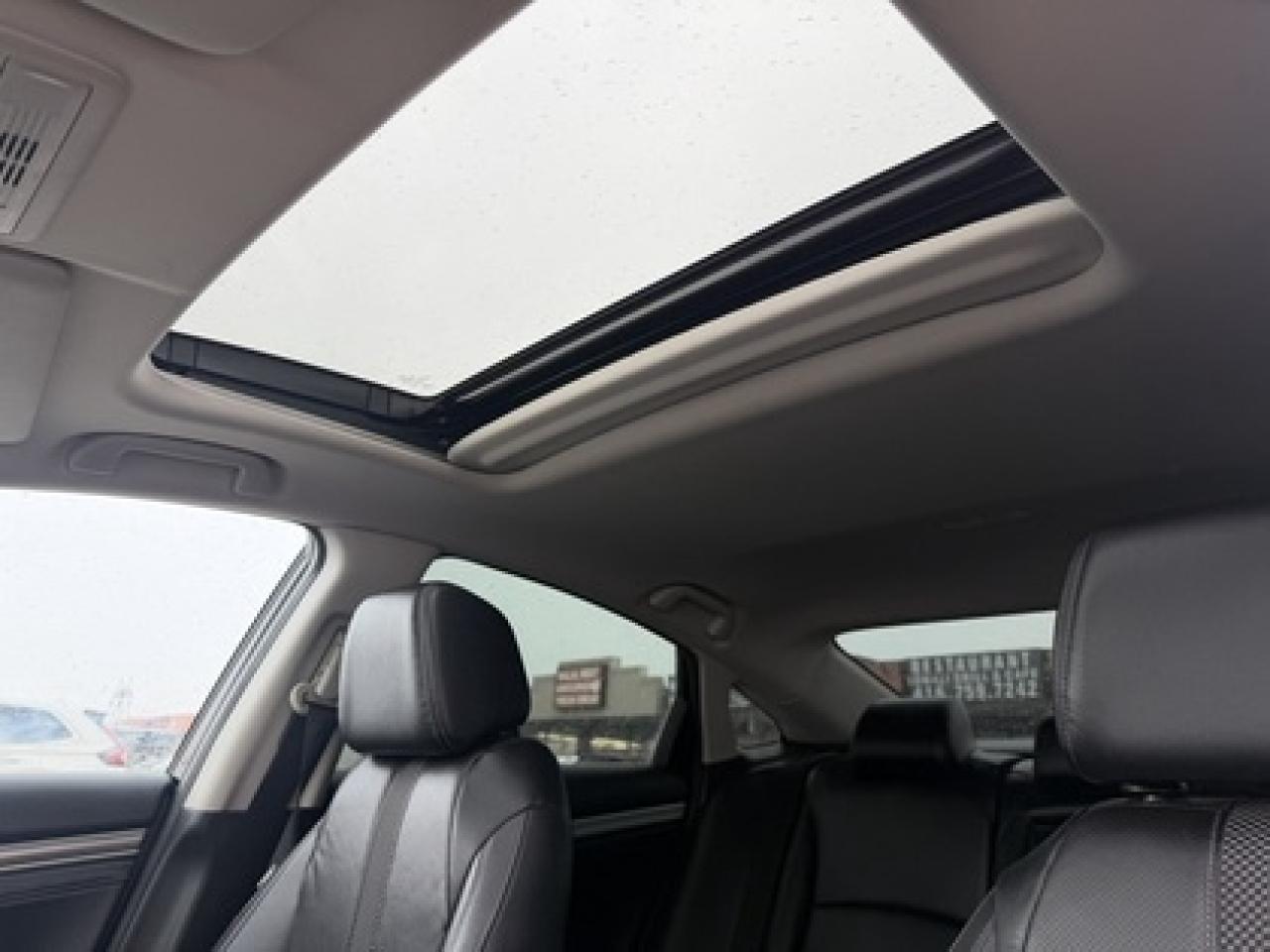 2021 Honda Civic Touring Sedan CVT Photo